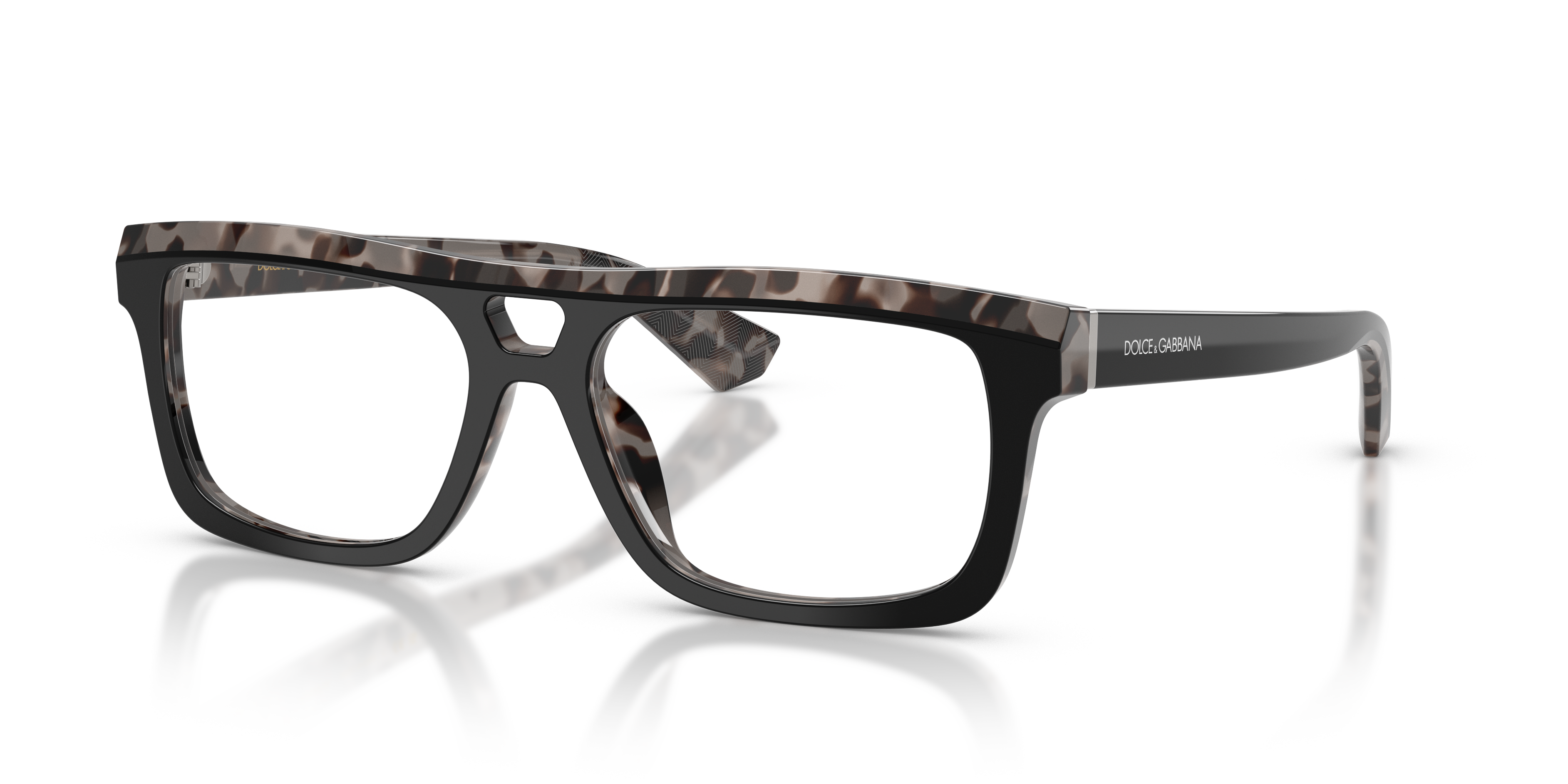 Primo piano di occhiali da sole Dolce&Gabbana DG3431 da uomo neri con aste tartarugate grigie, posti su una superficie chiara