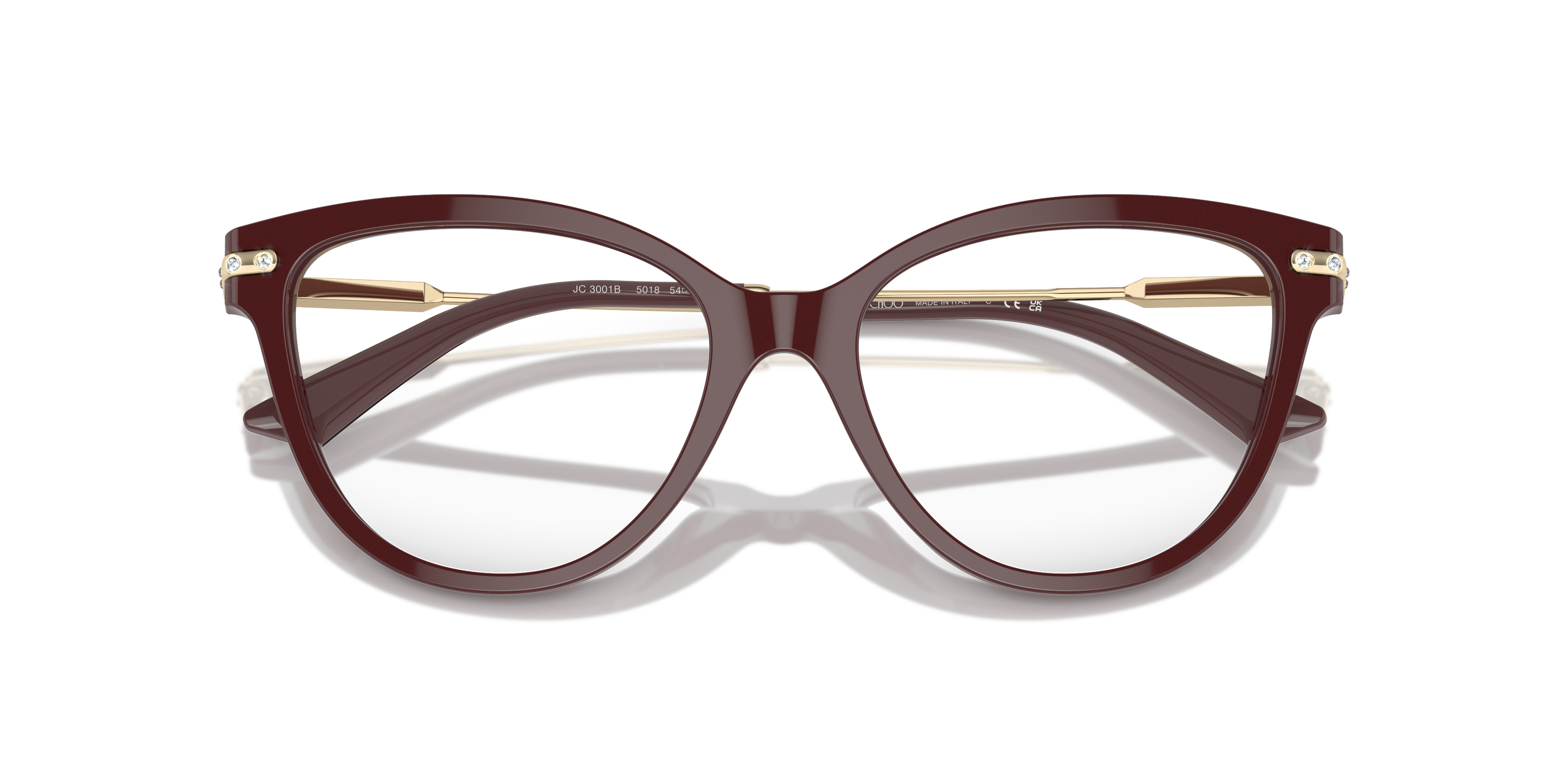 Occhiali da sole Jimmy Choo da donna, modello 0JC3001B, colore nero lucido, con lenti scure, appoggiati su una superficie chi