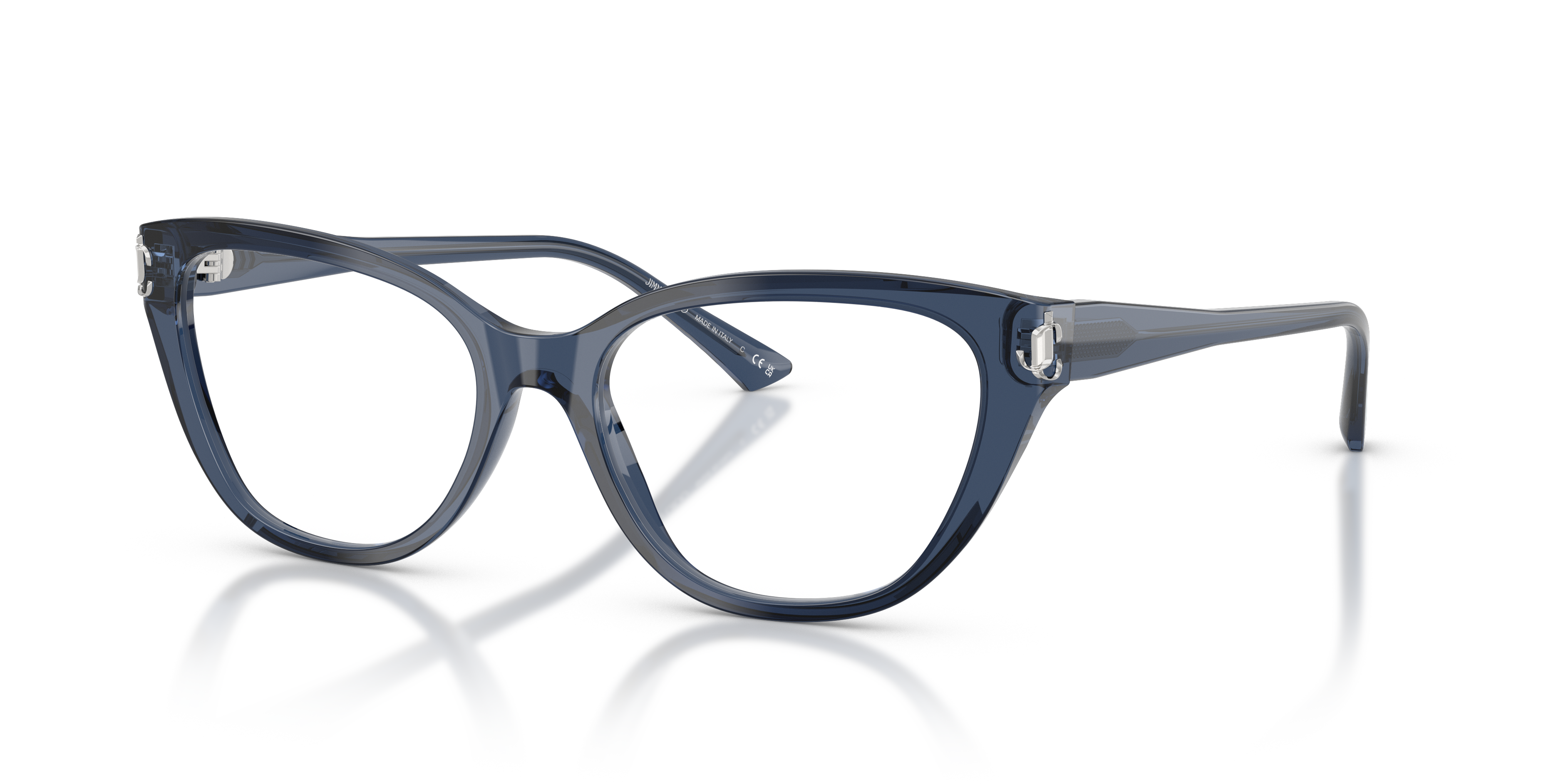 Donna sorridente che indossa occhiali da sole Jimmy Choo JC3011 Transparent Navy con montatura blu trasparente e lenti grigie