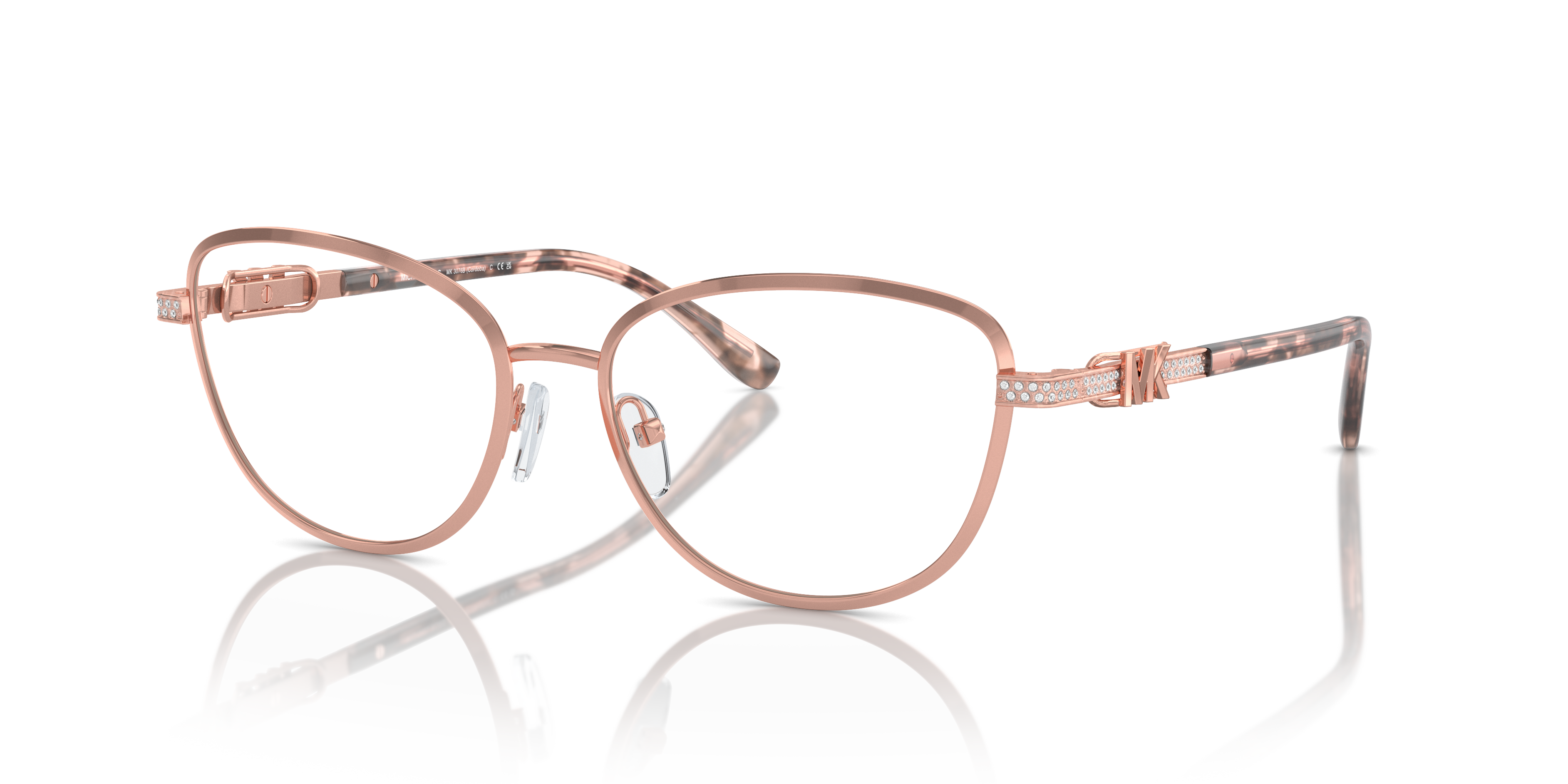 Occhiali da sole Michael Kors Cordoba 0MK3076B color oro rosa, indossati da una donna con capelli chiari, che mettono in risa