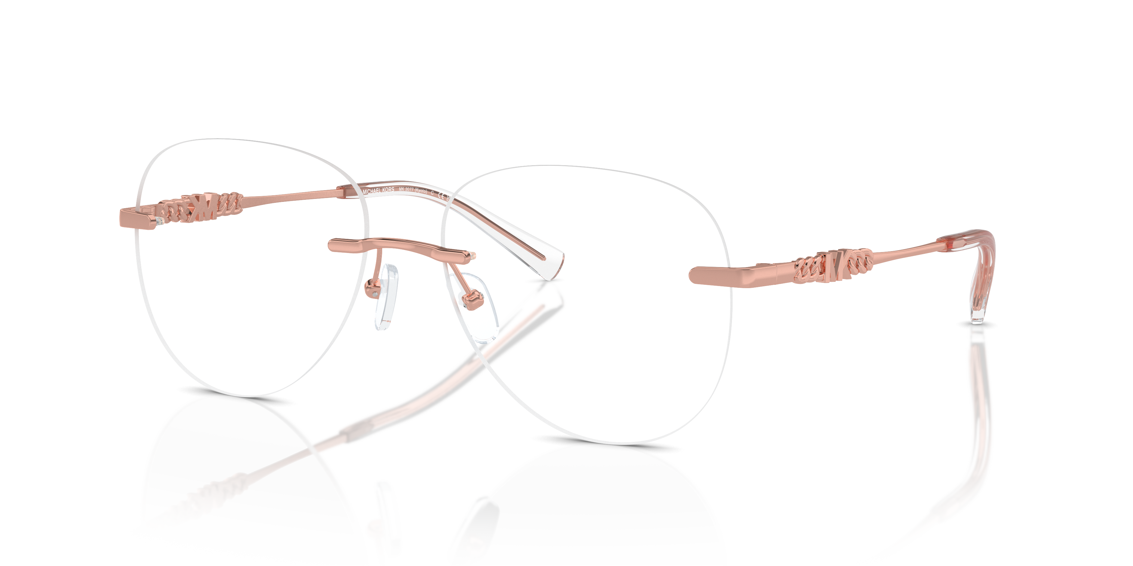 Occhiali da sole Michael Kors Kyoto 0MK3077 Shiny Rose Gold da donna, montati su un volto femminile sorridente, con sfondo sf