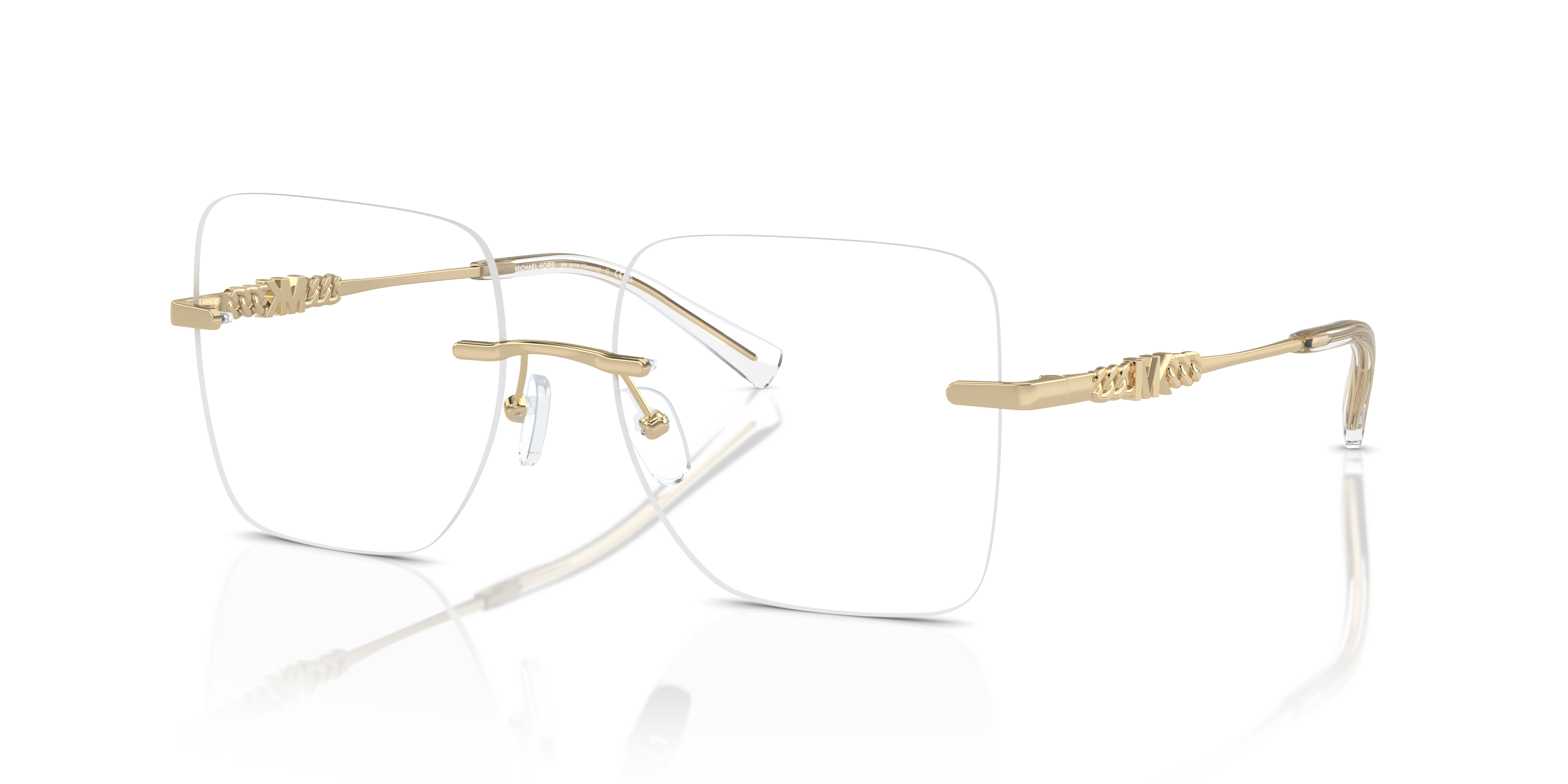 Occhiali da sole Michael Kors Giverny 0MK3078 colore oro indossati da una donna con sfondo sfocato all'aperto.