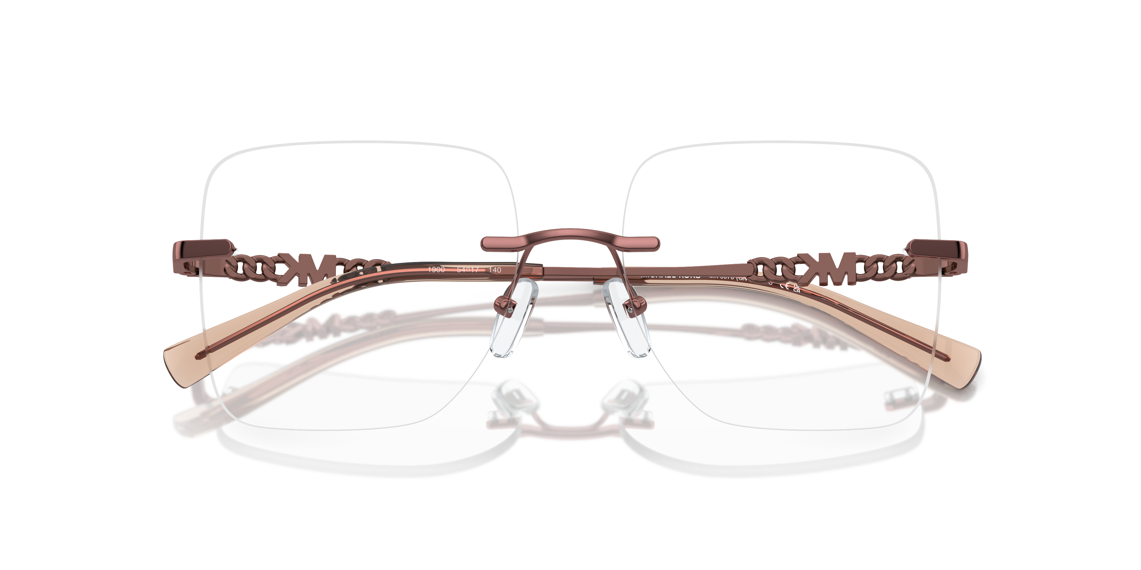 Occhiali da sole Michael Kors Giverny 0MK3078 colore oro indossati da una donna con sfondo sfocato all'aperto.