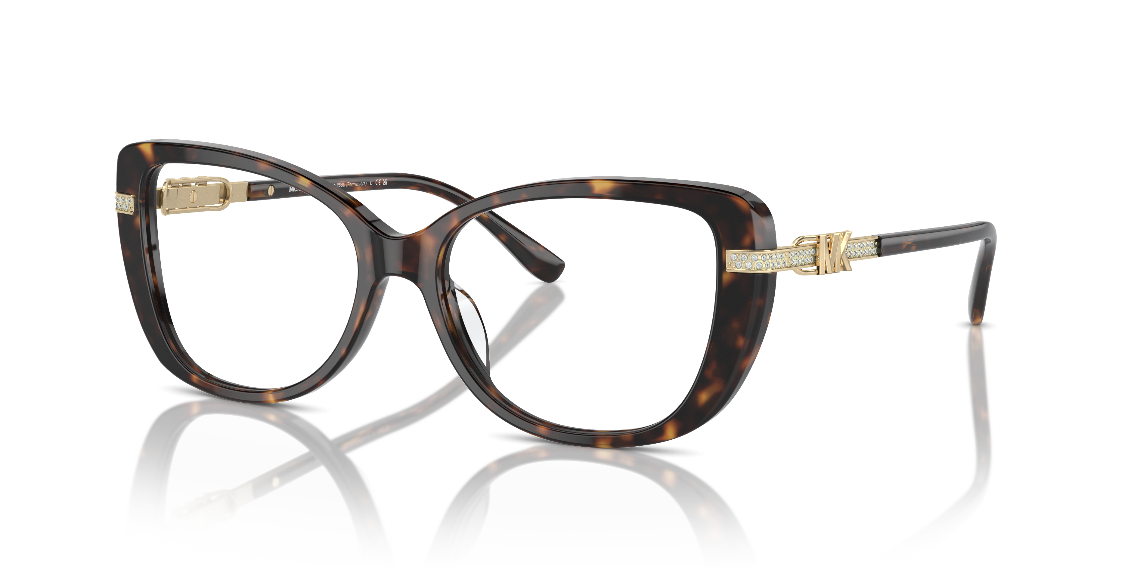 Donna con occhiali da sole Michael Kors 0MK4125BU Formentera color Dark Tortoise, montatura rotonda e lenti sfumate.
