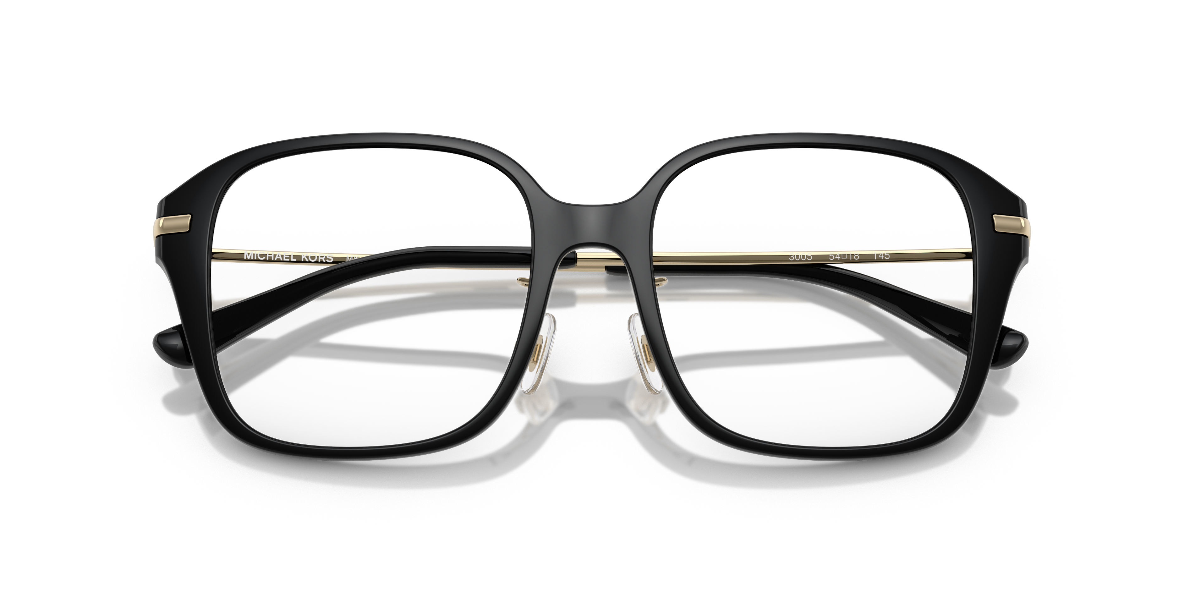 Occhiali da sole Michael Kors 0MK4131D Hangzhou neri, indossati da una donna, con montatura in acetato e lenti scure.