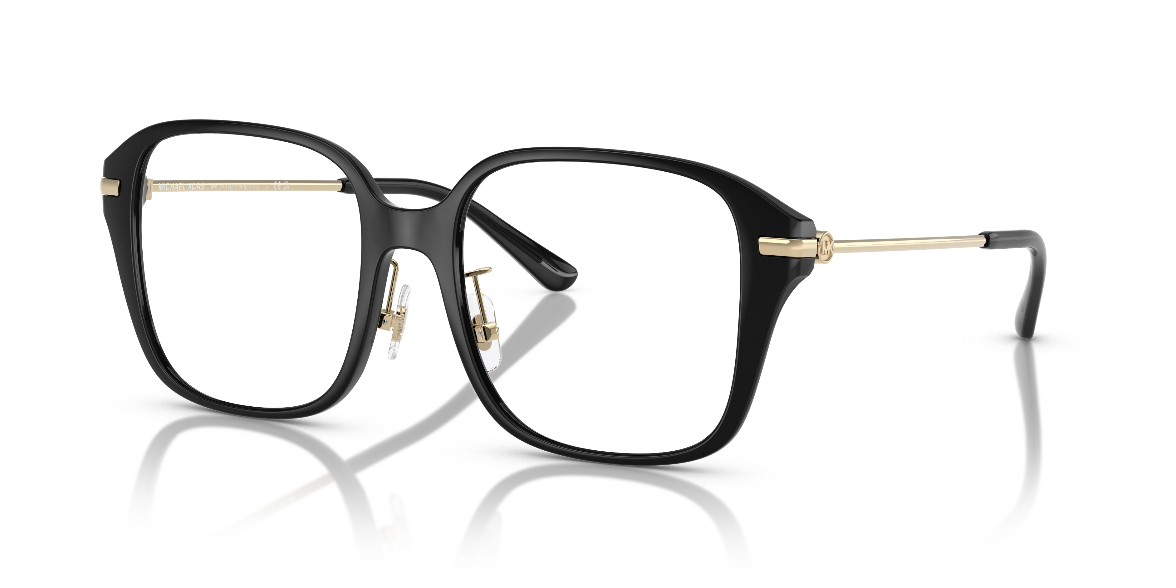 Occhiali da sole Michael Kors 0MK4131D Hangzhou neri, indossati da una donna, con montatura in acetato e lenti scure.