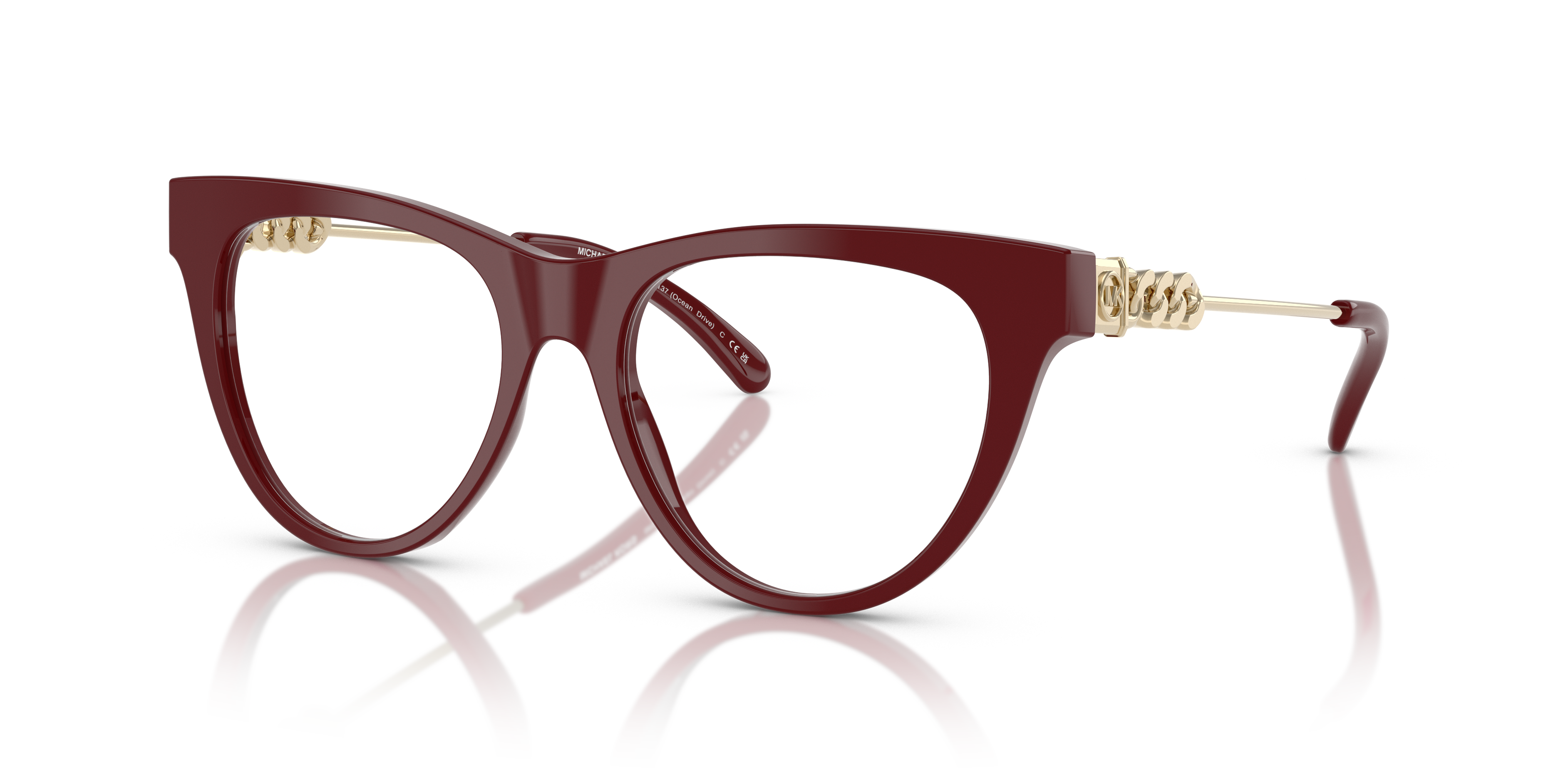 Occhiali da sole Michael Kors donna modello 0MK4137 Ocean Drive Deep Red indossati da una modella su sfondo sfocato all'apert