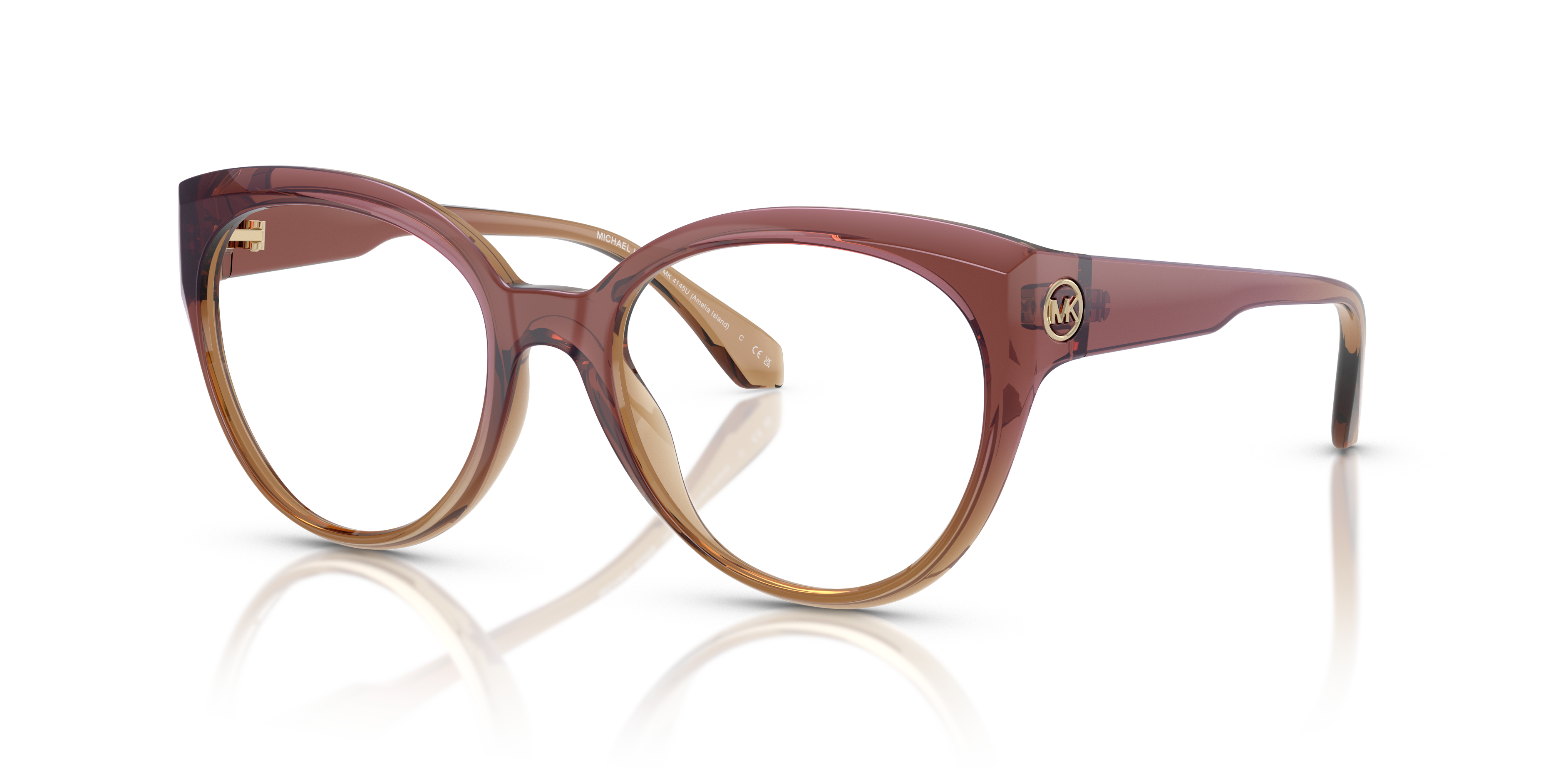 Occhiali da sole Michael Kors Amelia Island 0MK4145U rosa cipria con lenti marroni indossati da una donna elegante.