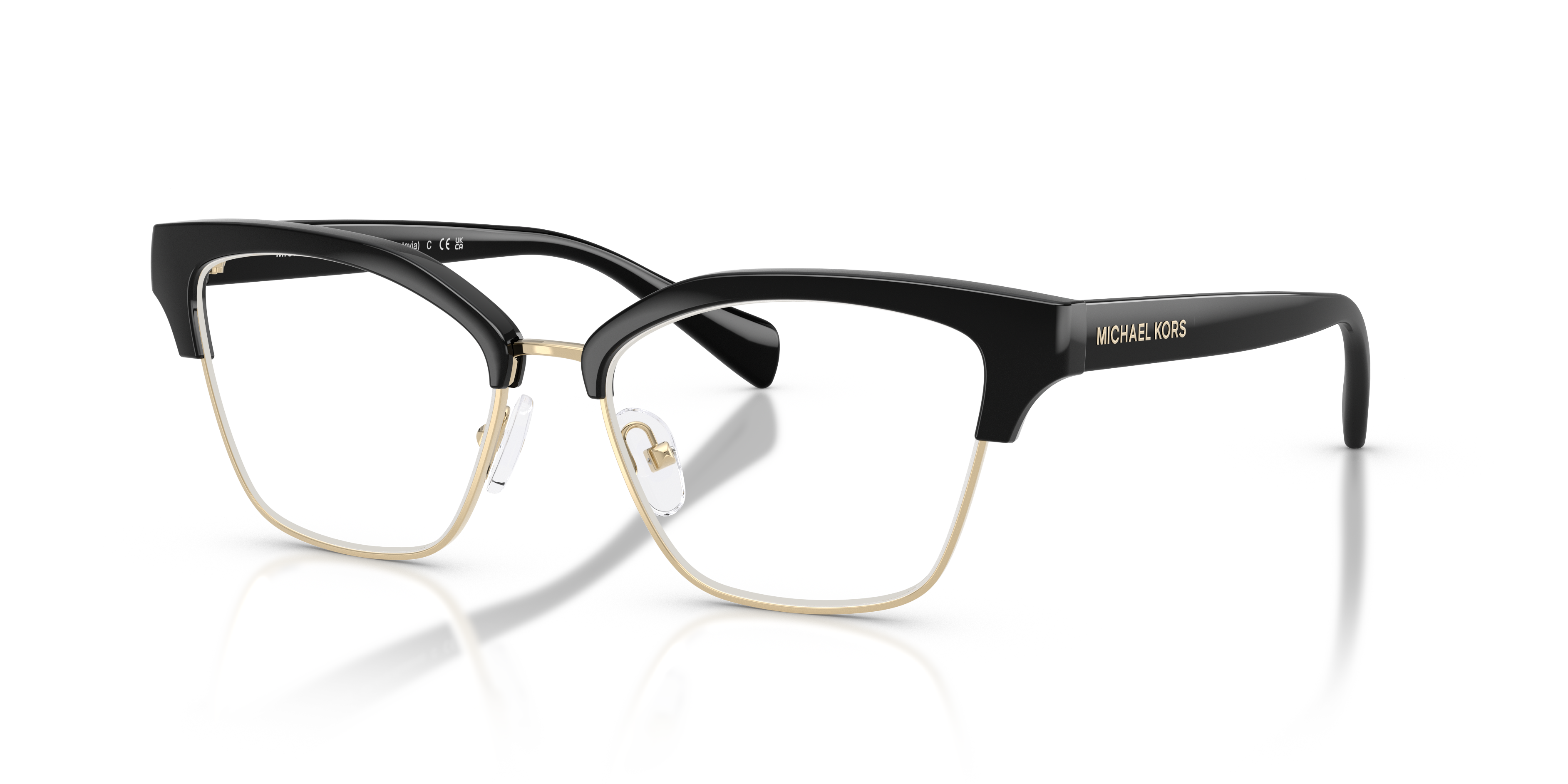 Occhiali da sole Michael Kors Gustavia neri da donna, modello 0MK4178, indossati su un volto femminile con capelli scuri
