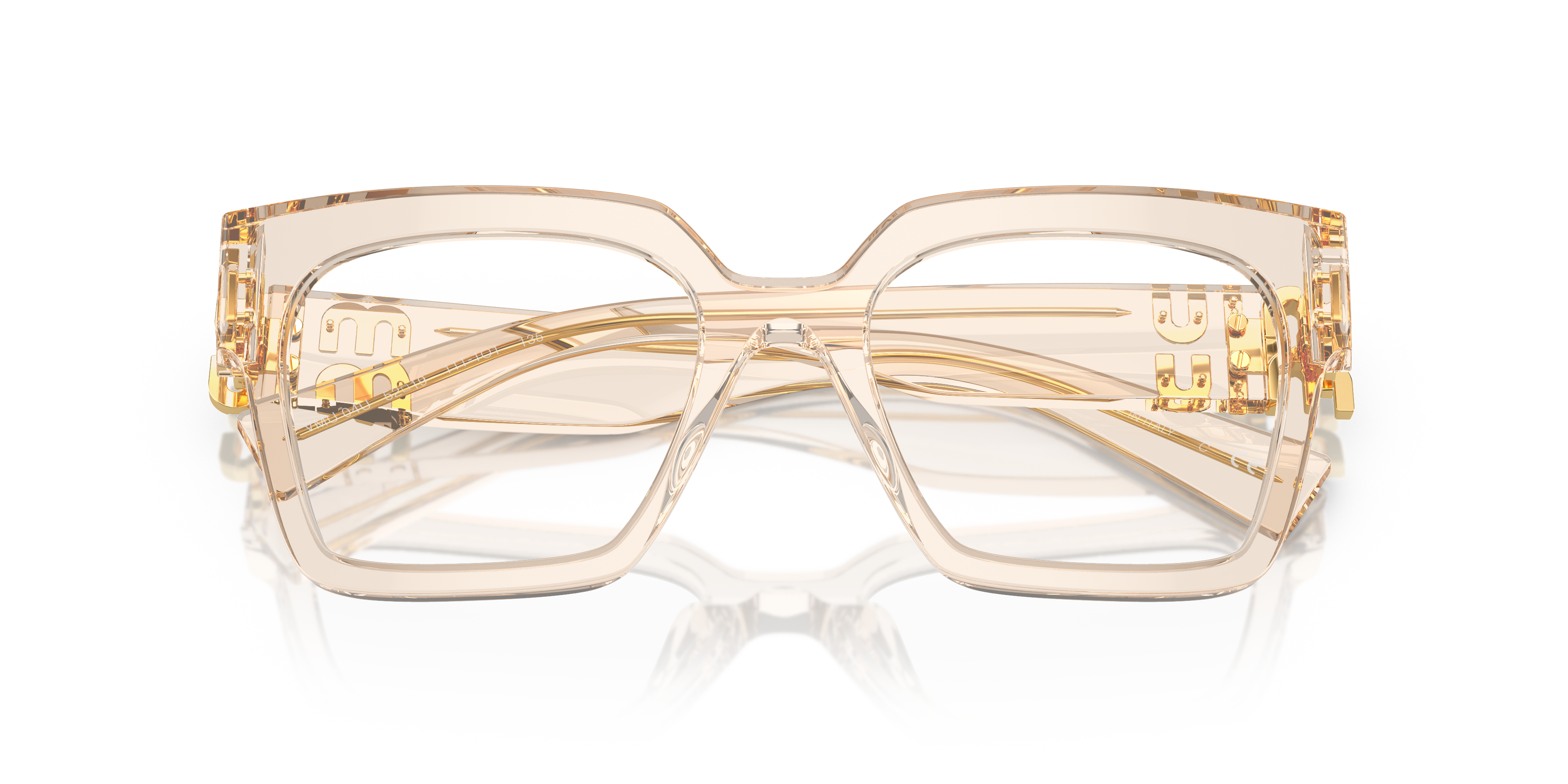 Occhiali da sole Miu Miu 0MU 04UV Crystal da donna con montatura trasparente e lenti grigie scure, indossati su un viso femmi