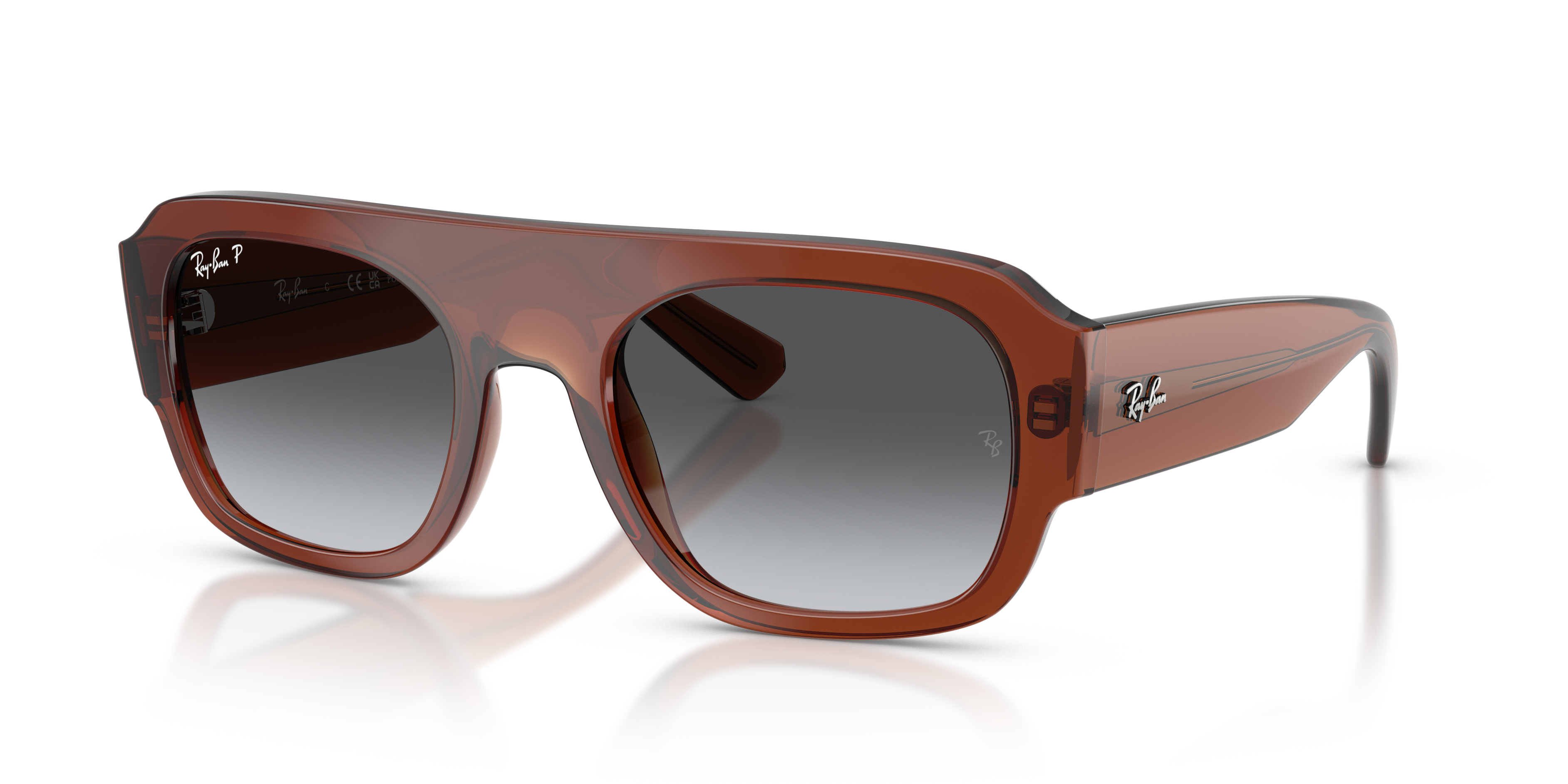 Occhiali da sole Ray-Ban RB2218 Transparent Brown unisex su sfondo chiaro, che mostra la montatura trasparente e le lenti mar