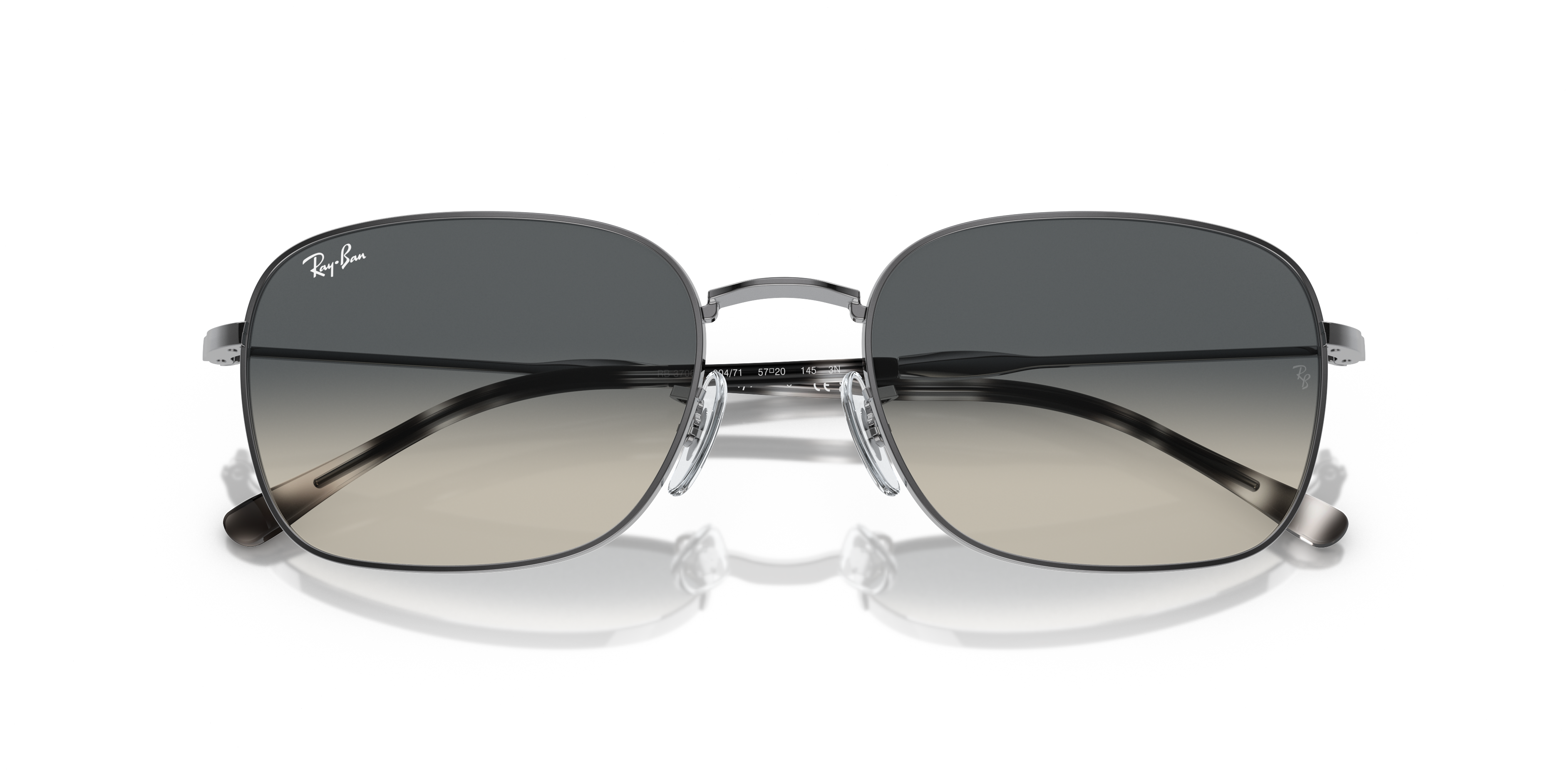 Occhiali da sole Ray-Ban RB3706 con montatura dorata Arista Gold e lenti verdi, indossati da una persona in primo piano.