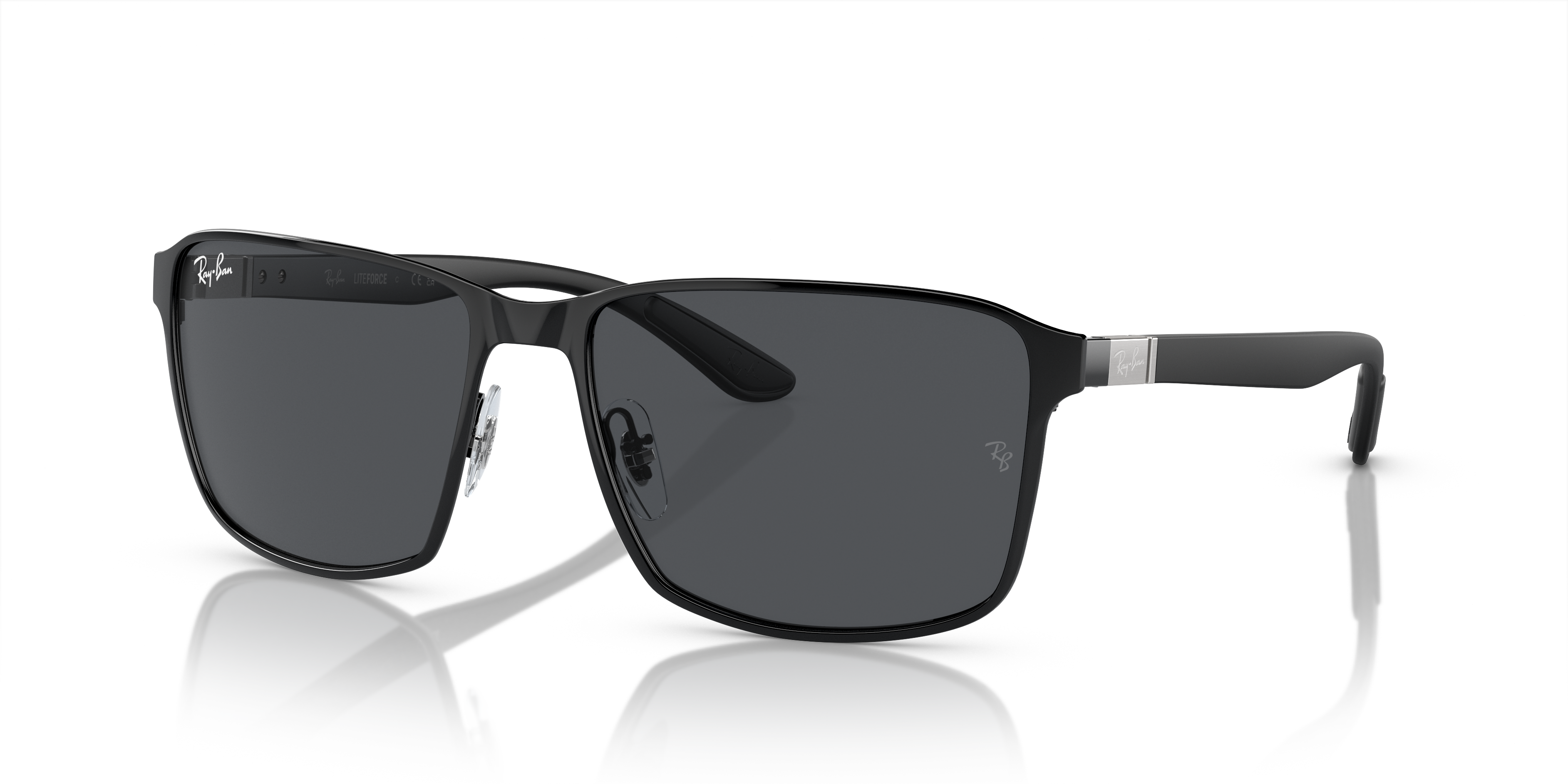 Occhiali da sole Ray-Ban RB3721 neri con montatura in metallo sottile e lenti tonde Black On Black, posizionati su una superf