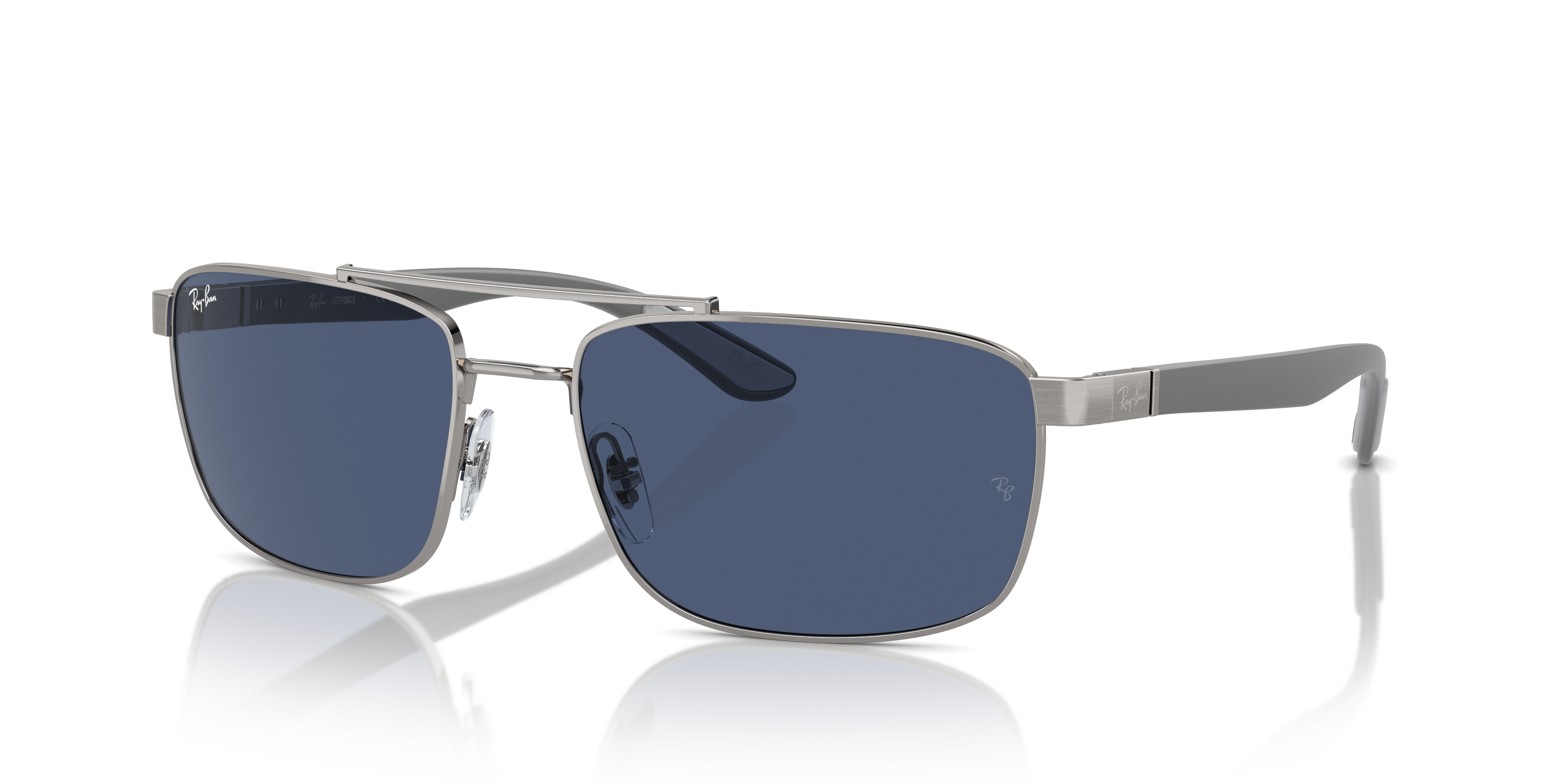 Occhiali da sole Ray-Ban RB3737 con montatura in metallo Gunmetal e lenti scure, posati su una superficie chiara