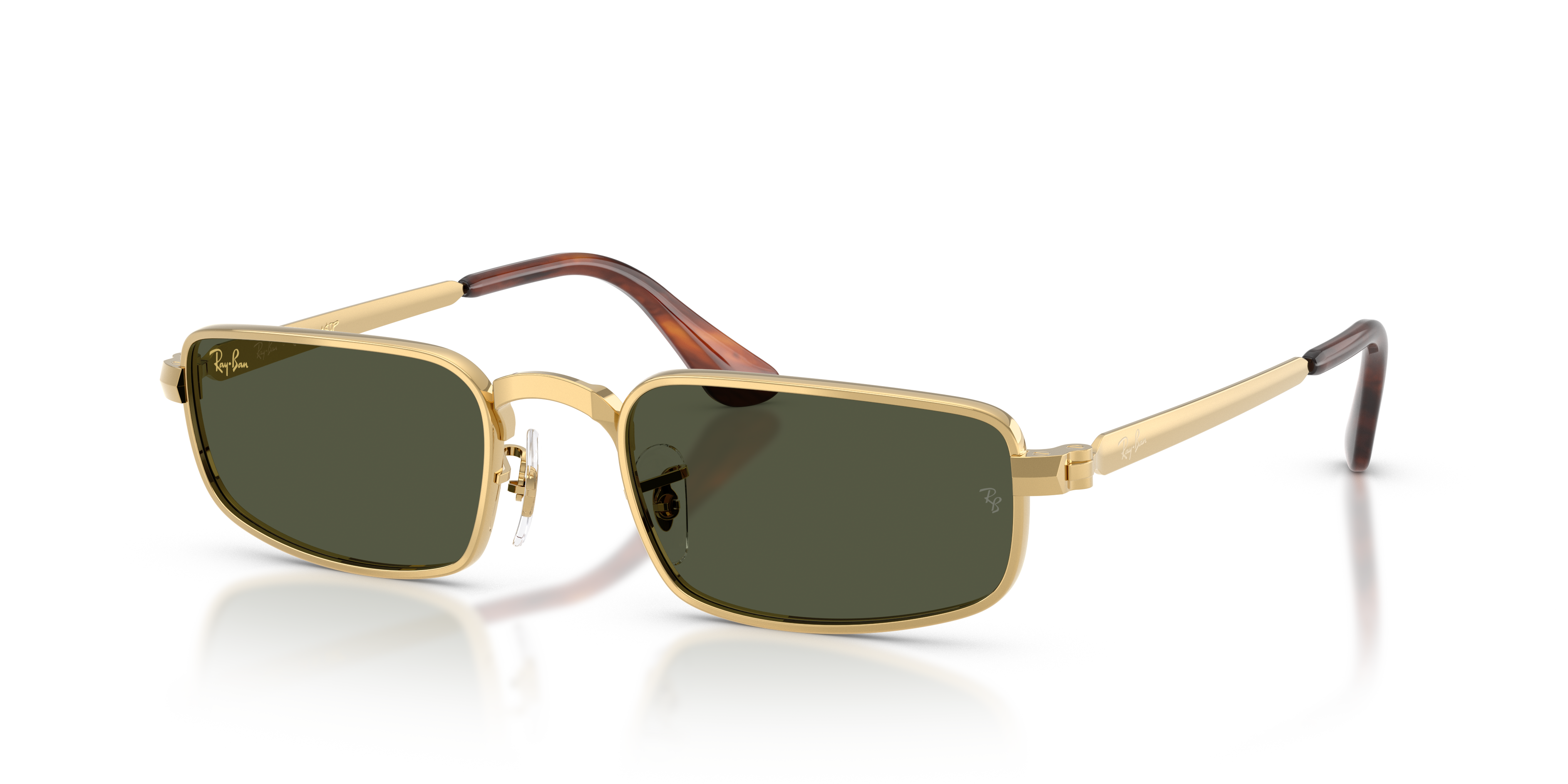 Occhiali da sole Ray-Ban RB3927 Arista Gold indossati da una persona, con montatura in metallo dorato e lenti scure, su sfond