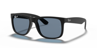 Occhiali da sole Ray-Ban Justin 0RB4165 da uomo, colore Opal Grey, montatura grigia opaca e lenti scure, su sfondo chiaro.