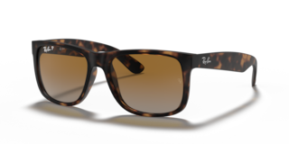 Occhiali da sole Ray-Ban Justin 0RB4165 da uomo, colore Opal Grey, montatura grigia opaca e lenti scure, su sfondo chiaro.