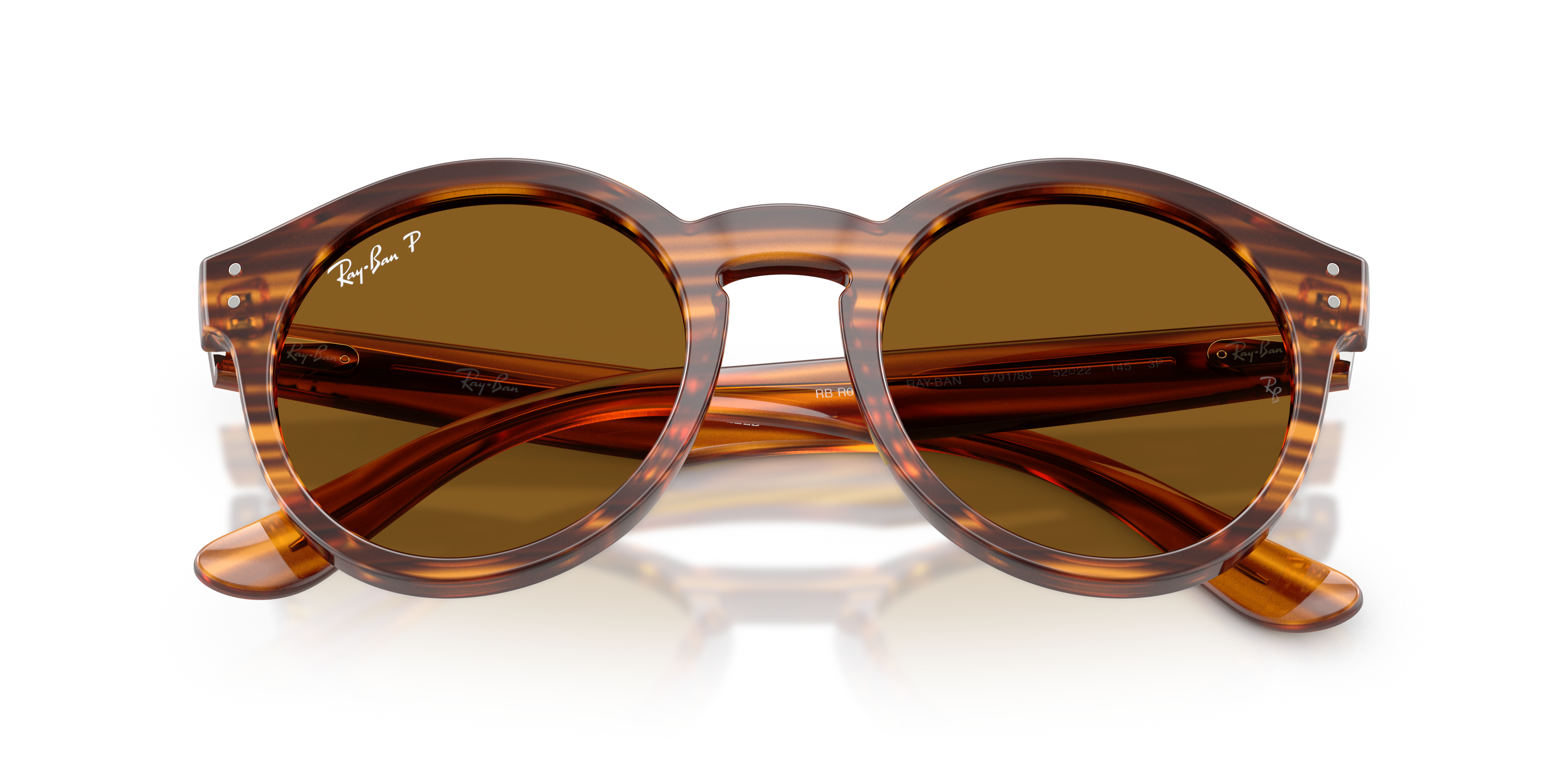 Occhiali da sole Ray-Ban Reverse 0RBR0505S Transparent Dark Grey con lenti invertite, posati su una superficie chiara, mostra