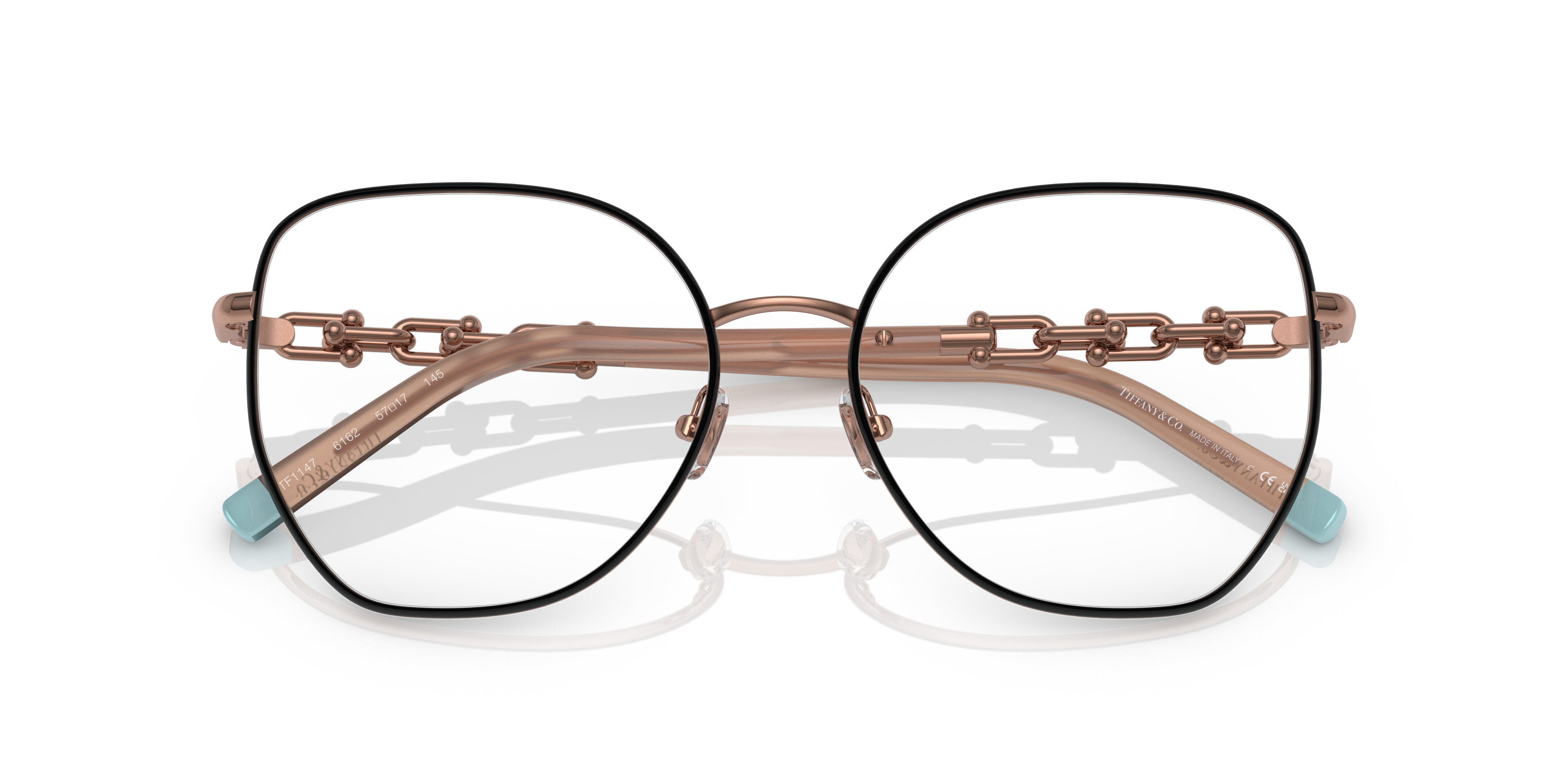 Occhiali da sole Tiffany TF1147 da donna, neri con interno color Rubedo, mostrati su sfondo bianco