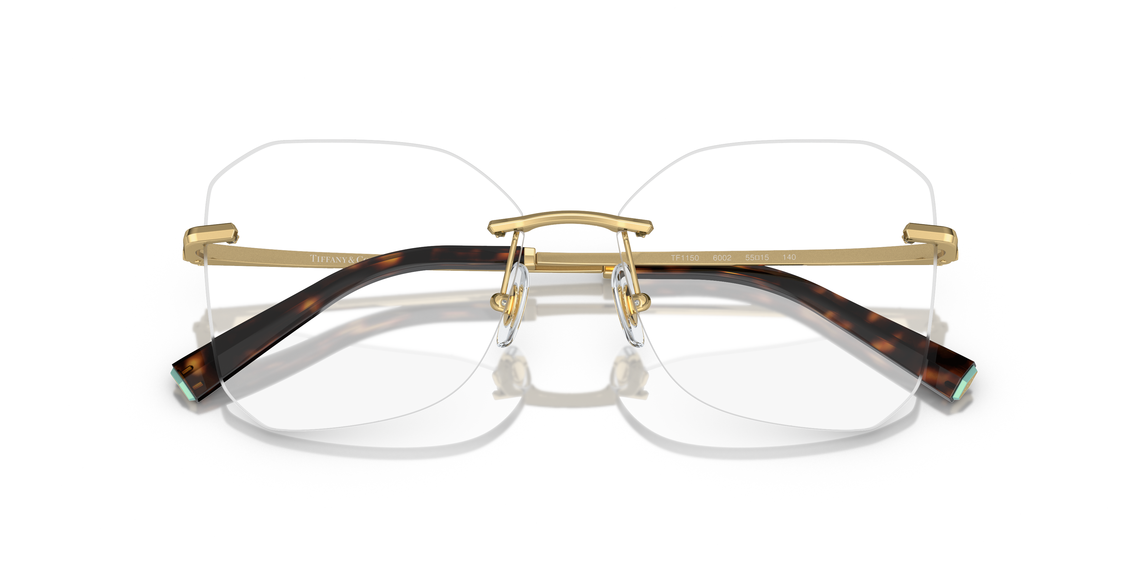 Occhiali da sole Tiffany TF1150 da donna, colore Pale Gold, mostrati frontalmente con lenti scure e montatura in metallo dora