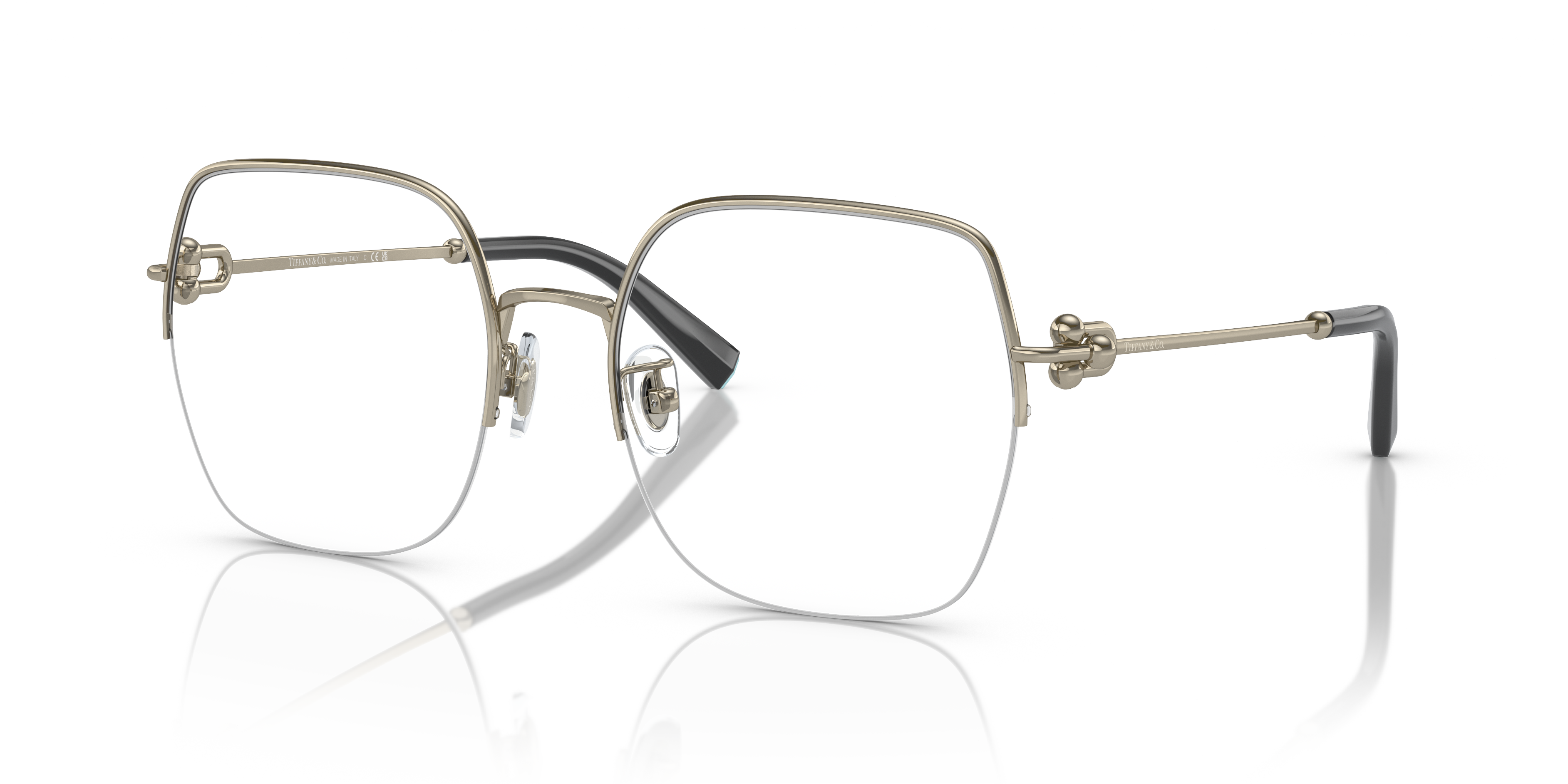 Occhiali da sole Tiffany donna modello TF1153D in metallo color Pale Gold, con lenti scure e design raffinato