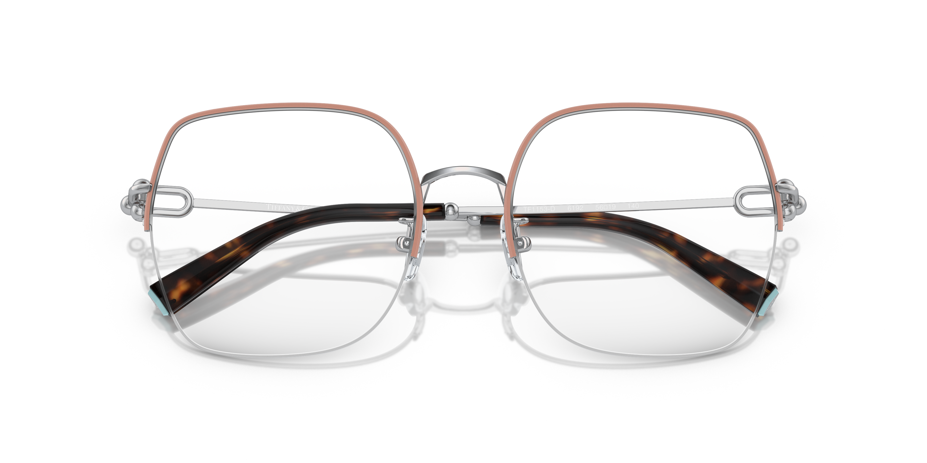 Occhiali da sole Tiffany donna modello TF1153D in metallo color Pale Gold, con lenti scure e design raffinato