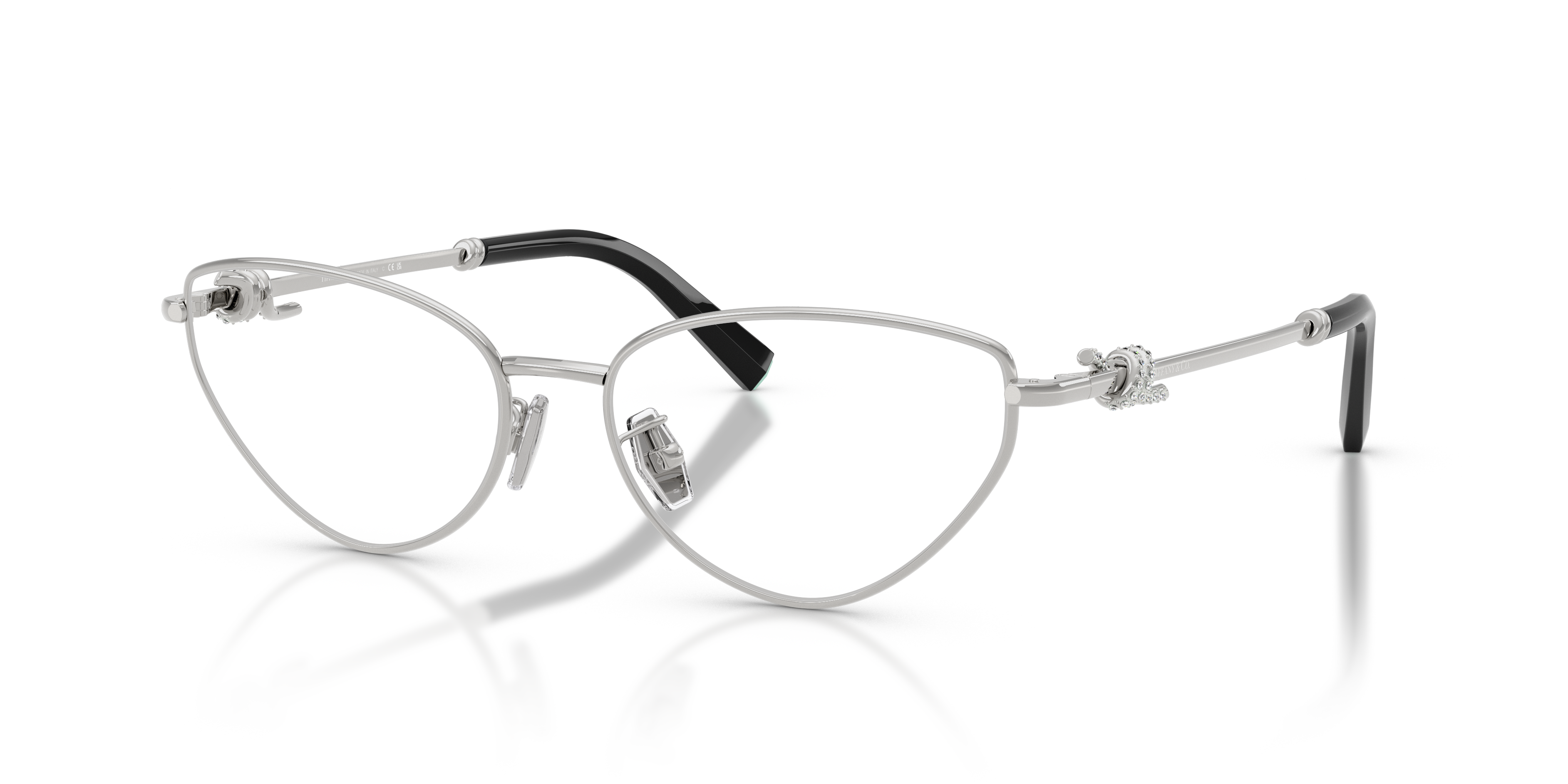 Occhiali da sole Tiffany & Co. modello TF1172B da donna, con montatura in metallo colore argento e lenti scure, su sfondo chi