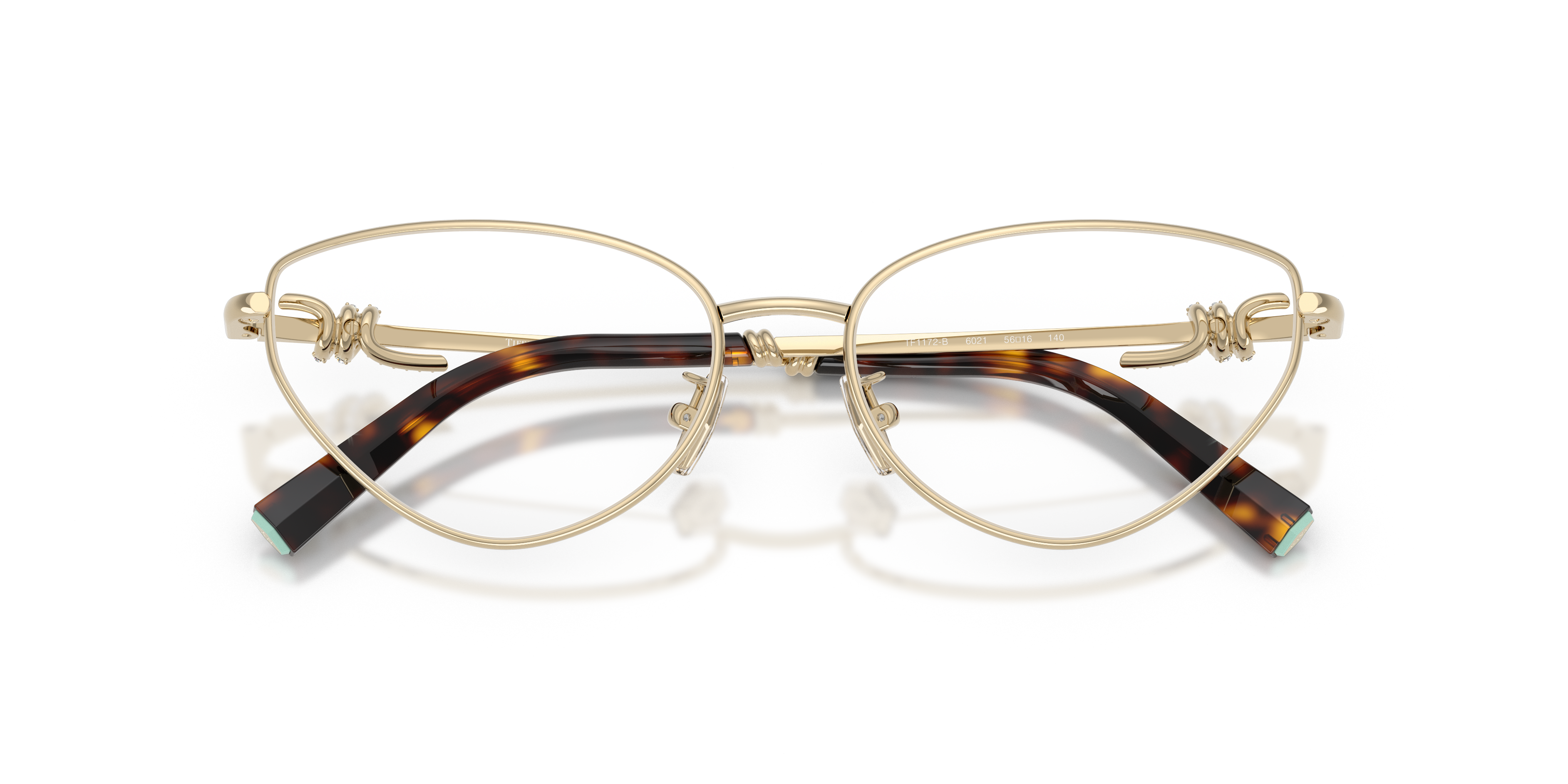 Occhiali da sole Tiffany & Co. modello TF1172B da donna, con montatura in metallo colore argento e lenti scure, su sfondo chi