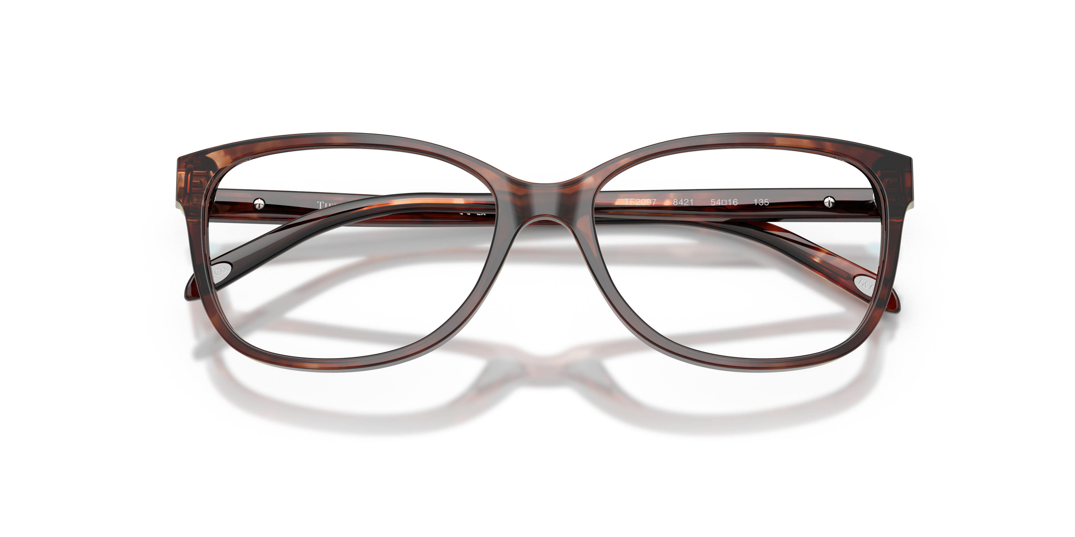 Occhiali da sole Tiffany & Co. TF2097 da donna in colore Havana, montatura a farfalla e lenti scure, su sfondo bianco.