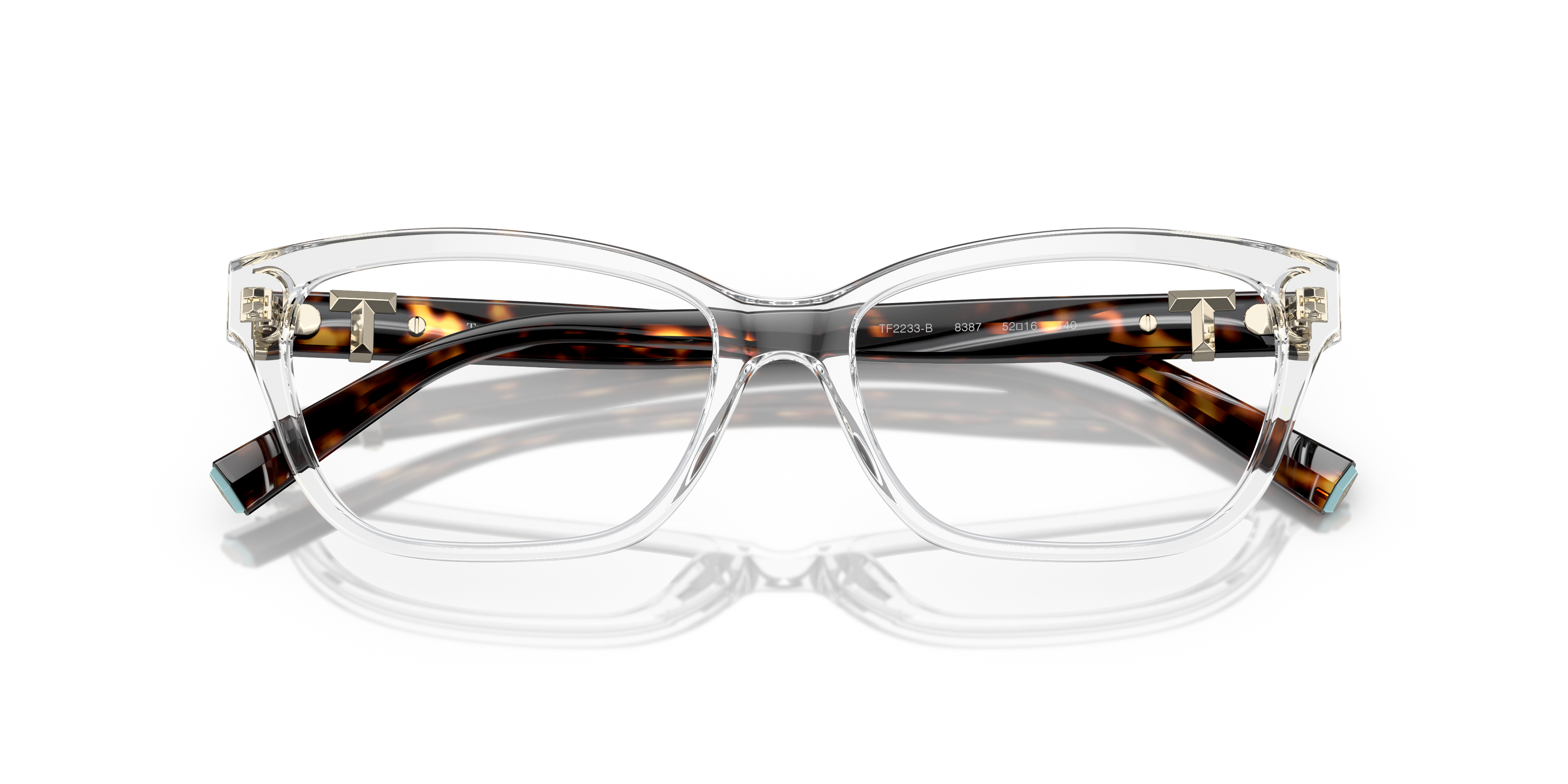 Occhiali da sole Tiffany & Co TF2233B trasparenti con lenti scure su sfondo chiaro, visibili da un'angolazione frontale, per