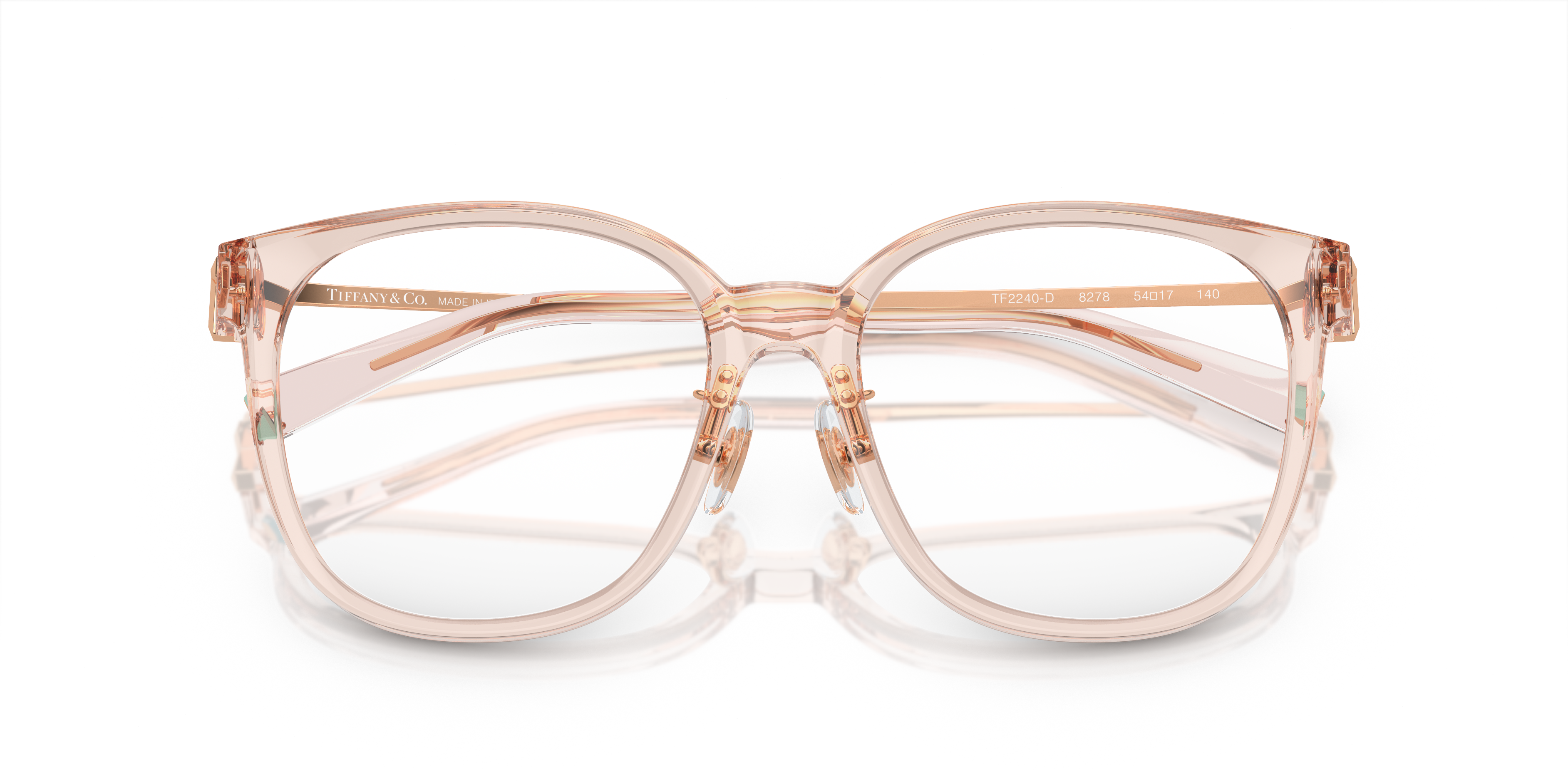 Occhiali da sole Tiffany & Co. TF2240D da donna colore Crystal Nude su sfondo bianco con custodia e panno