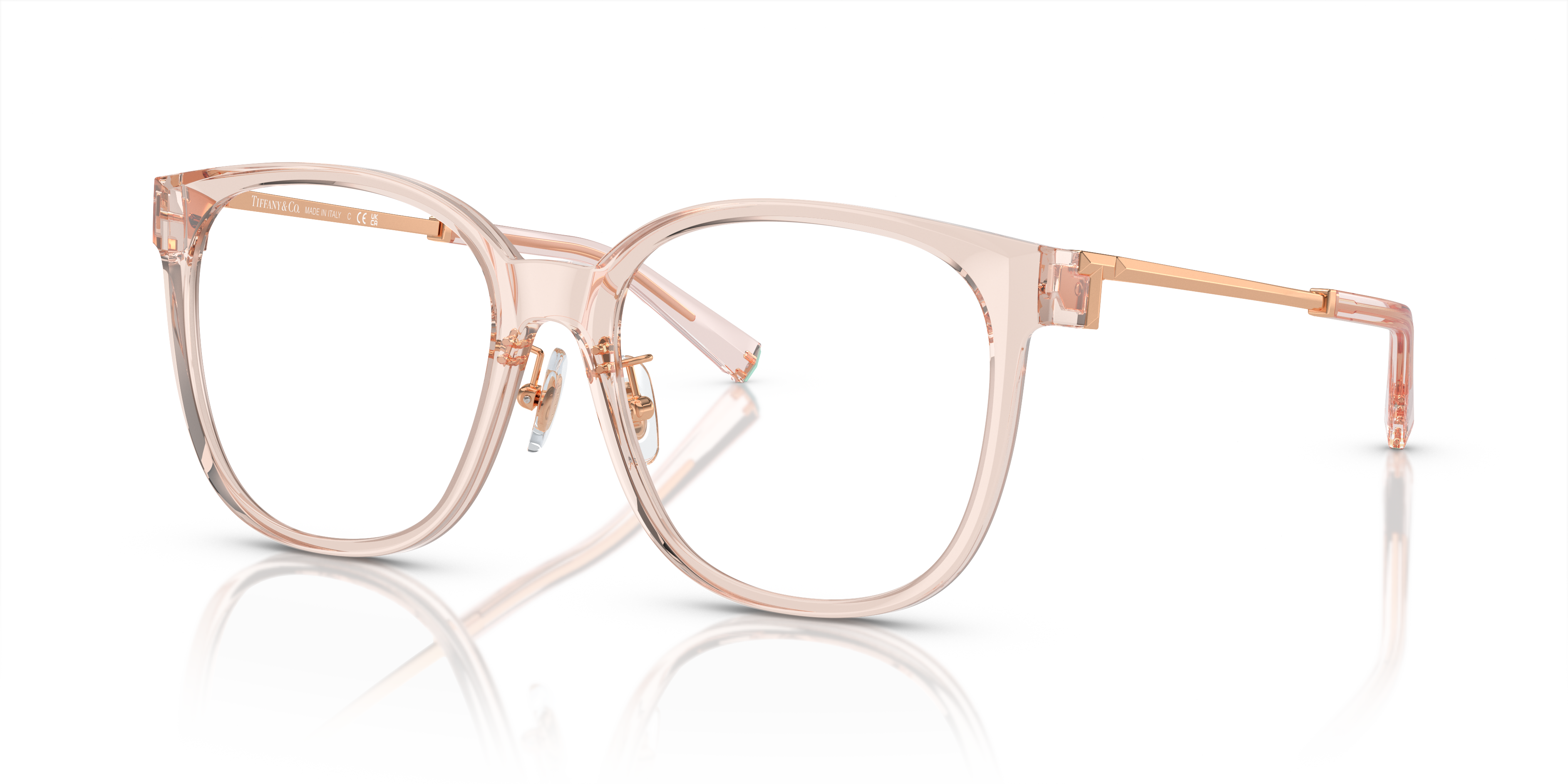 Occhiali da sole Tiffany & Co. TF2240D da donna colore Crystal Nude su sfondo bianco con custodia e panno