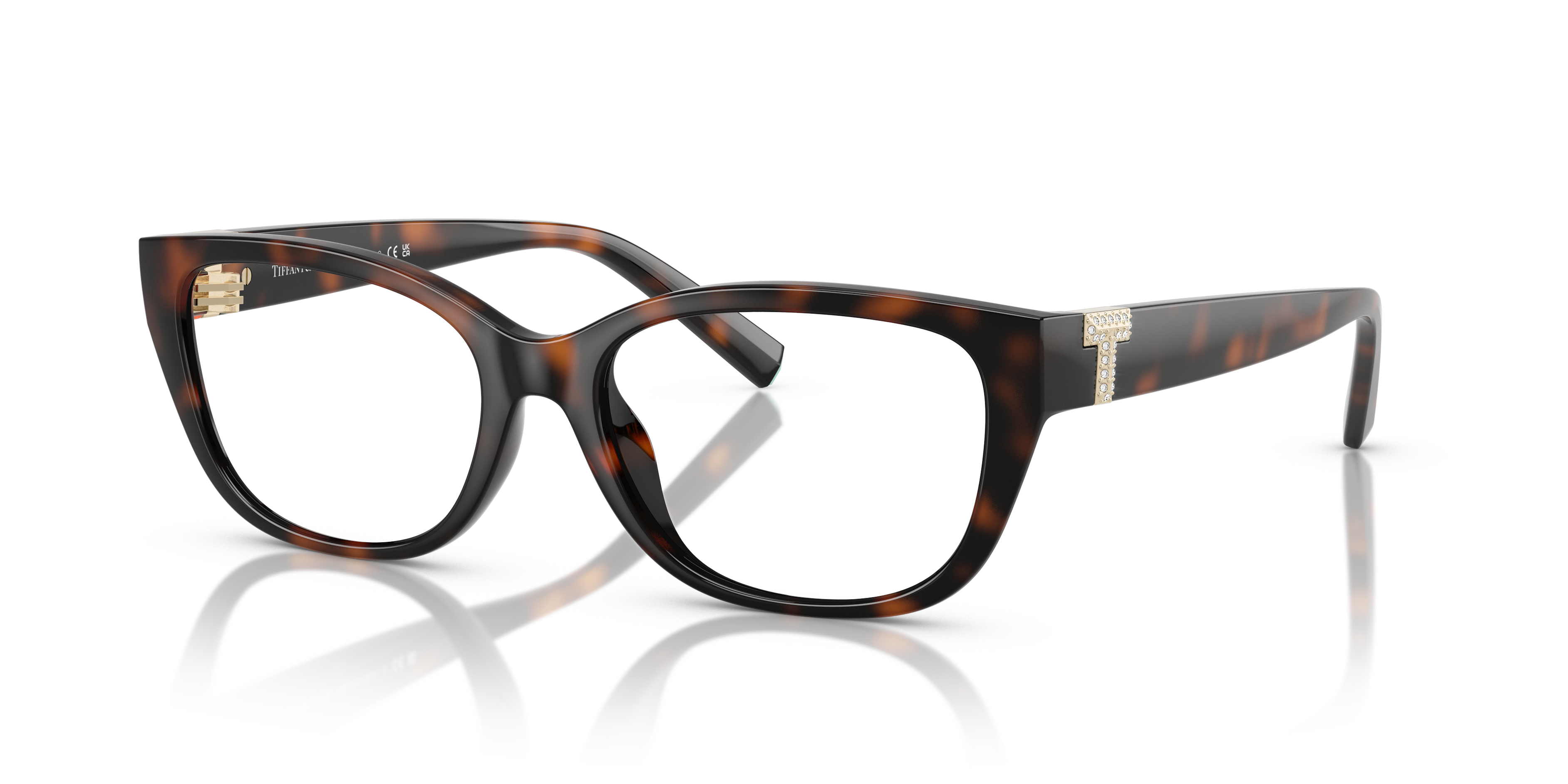 Donna con occhiali da sole Tiffany TF2254BU Havana, montatura marrone tartarugato con lenti scure, dettagli argento sull'asta