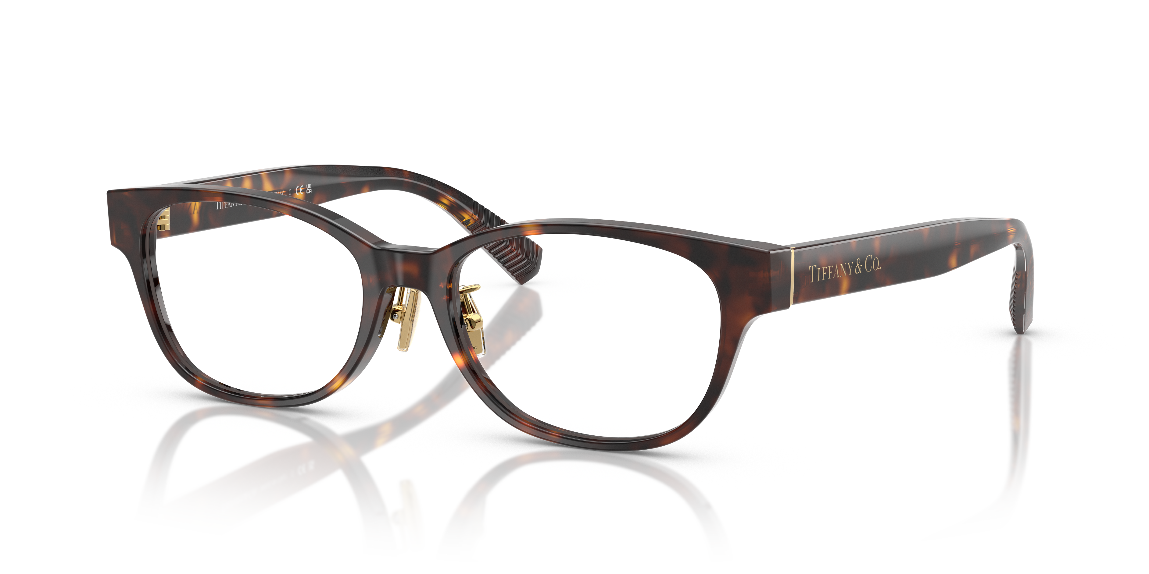 Occhiali da sole Tiffany TF2263D Havana da donna, con montatura tartarugata e lenti scure, mostrati su un fondo neutro elegan