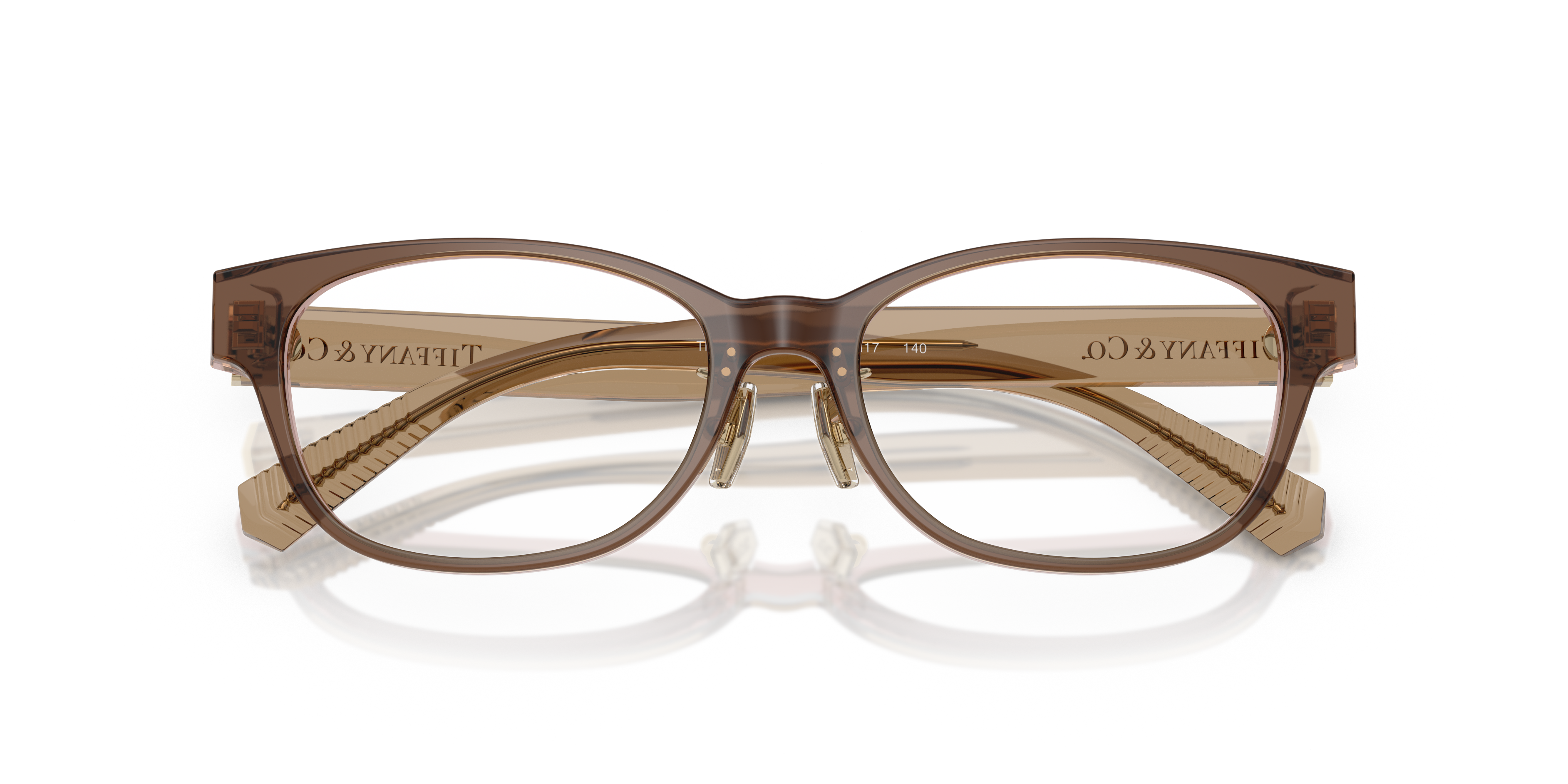 Occhiali da sole Tiffany TF2263D Havana da donna, con montatura tartarugata e lenti scure, mostrati su un fondo neutro elegan