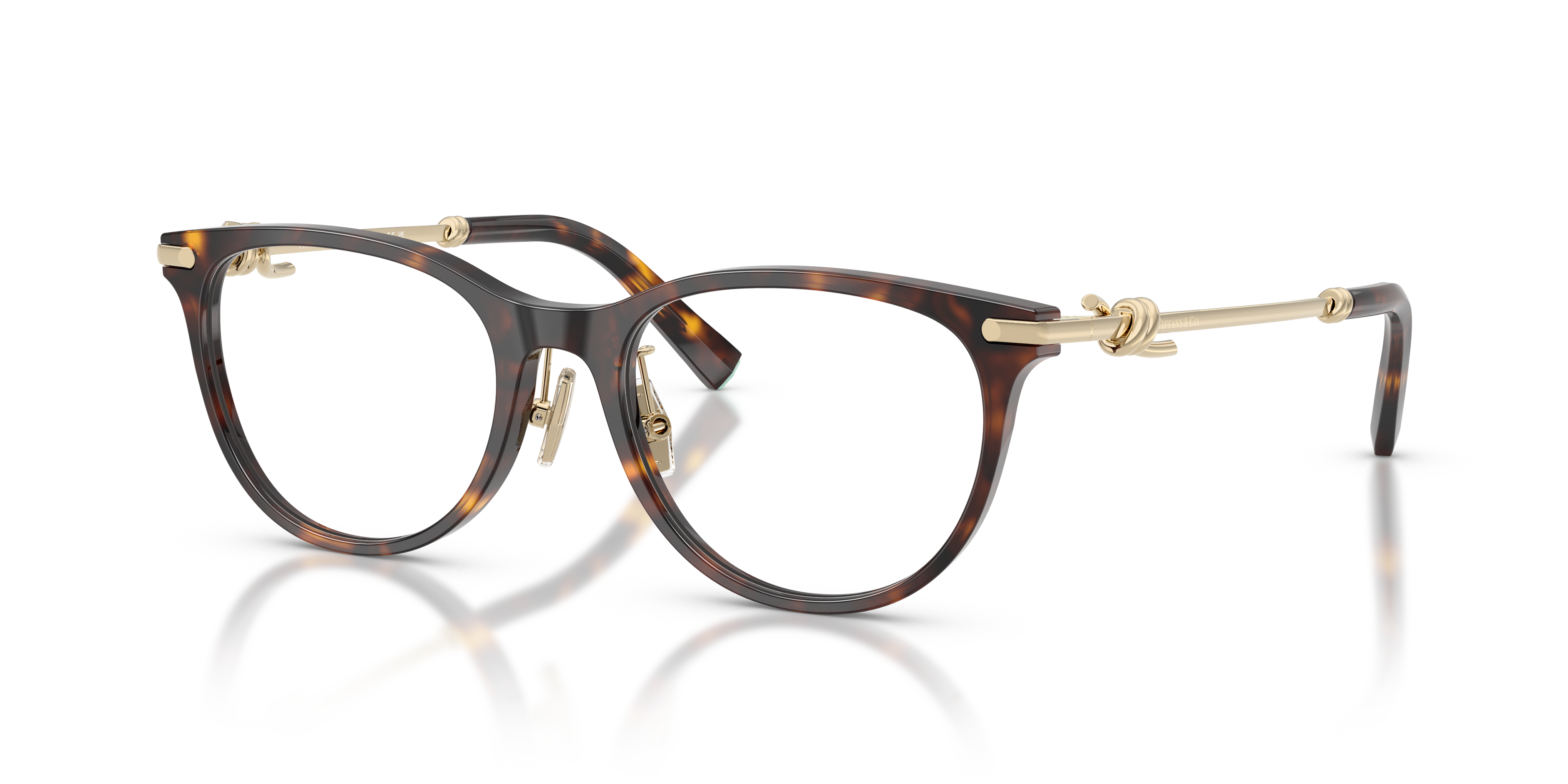 Occhiali da sole Tiffany & Co. TF2279D da donna in colorazione Havana, con montatura elegante e lenti scure, mostrati su sfon
