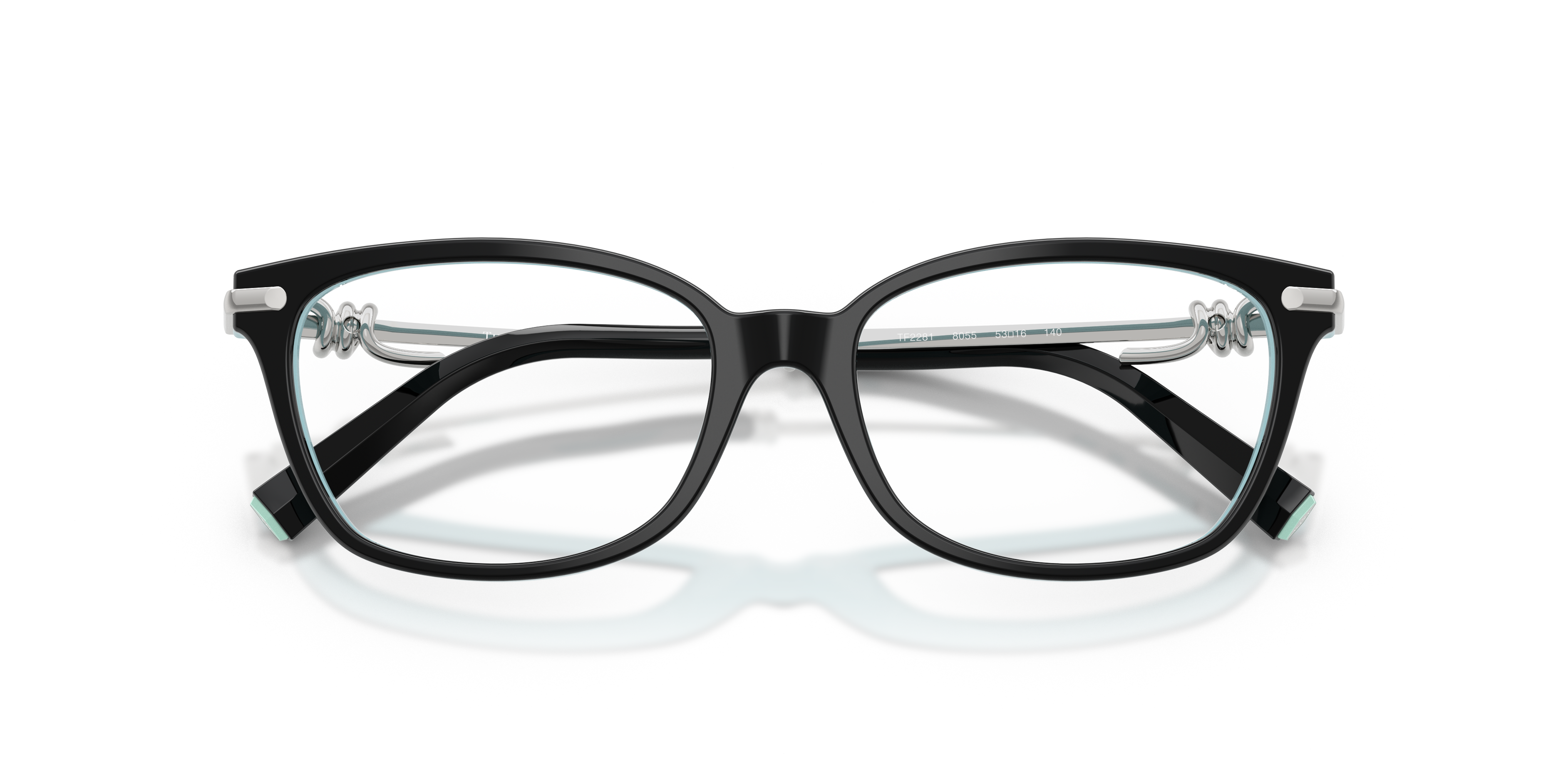 Occhiali da sole Tiffany & Co. modello TF2281 da donna, con montatura in acetato color Havana e lenti scure, posti su una sup