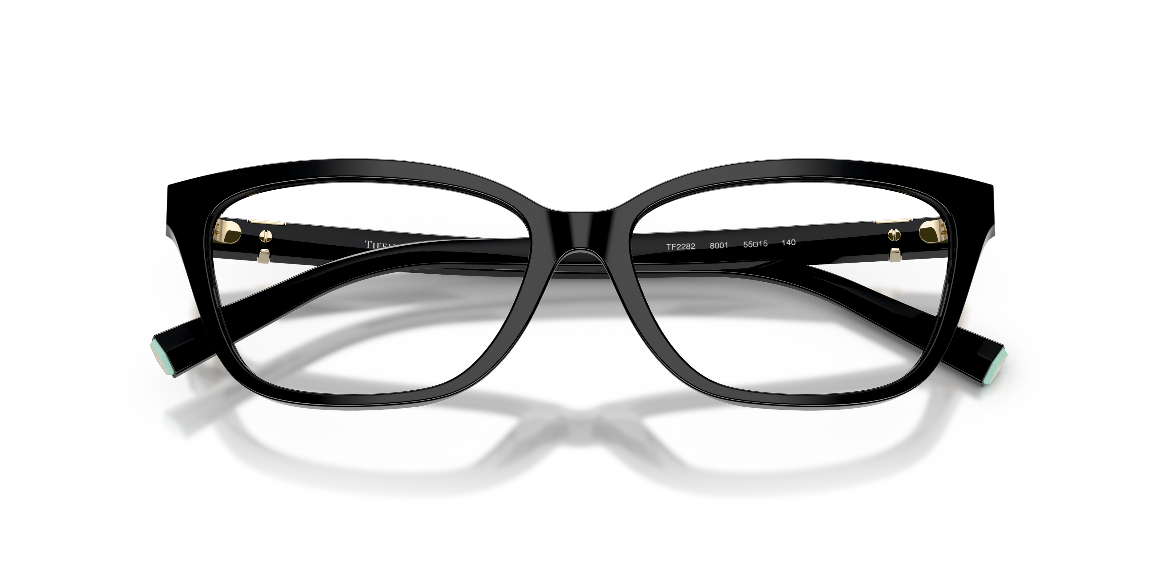 Occhiali da sole Tiffany TF2282 da donna con montatura trasparente lucida e lenti grigie, presentati su sfondo chiaro