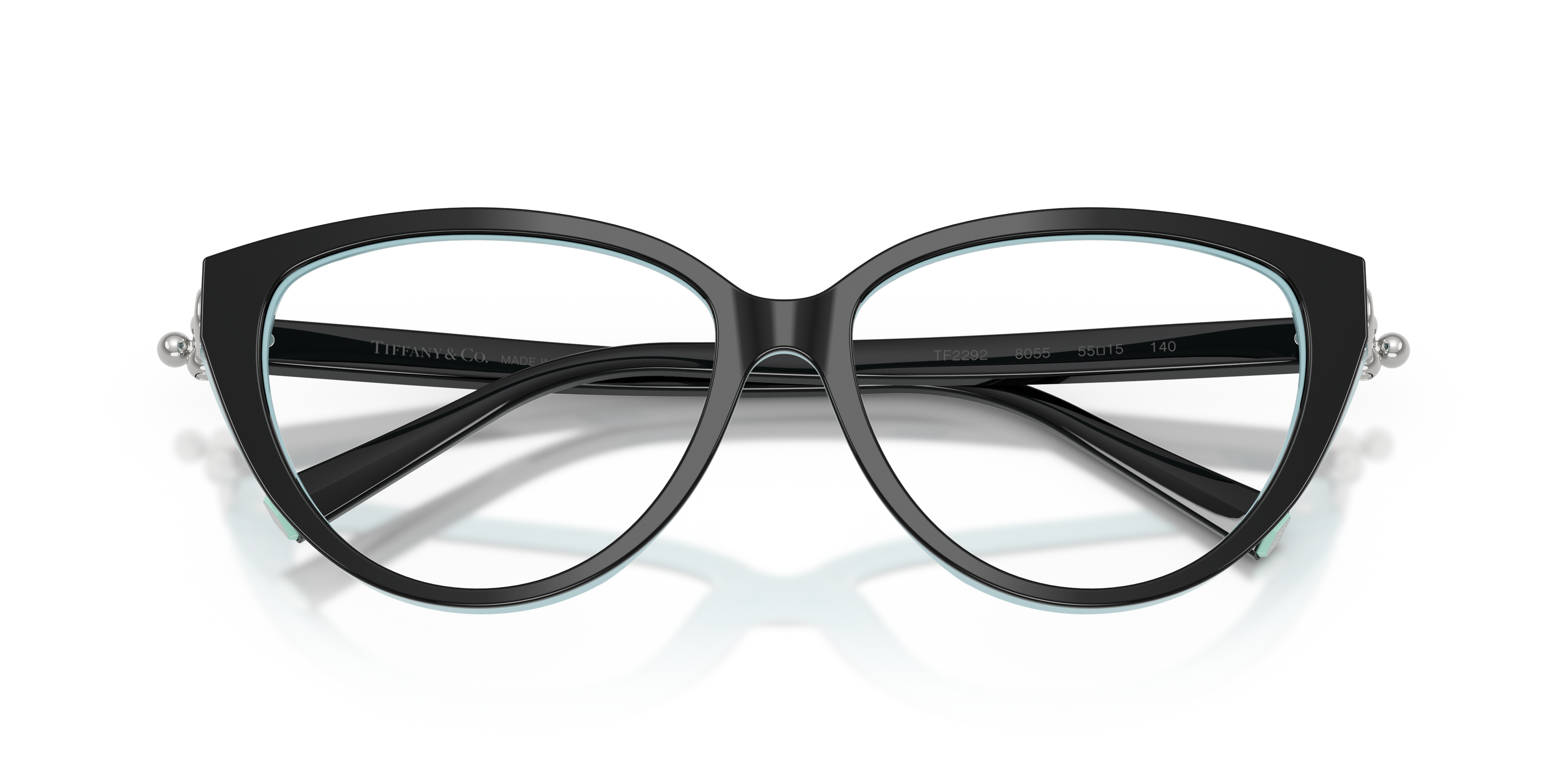 Occhiali da sole da donna Tiffany TF2292 in colore Havana con lenti sfumate su sfondo chiaro. Montatura a farfalla in acetato