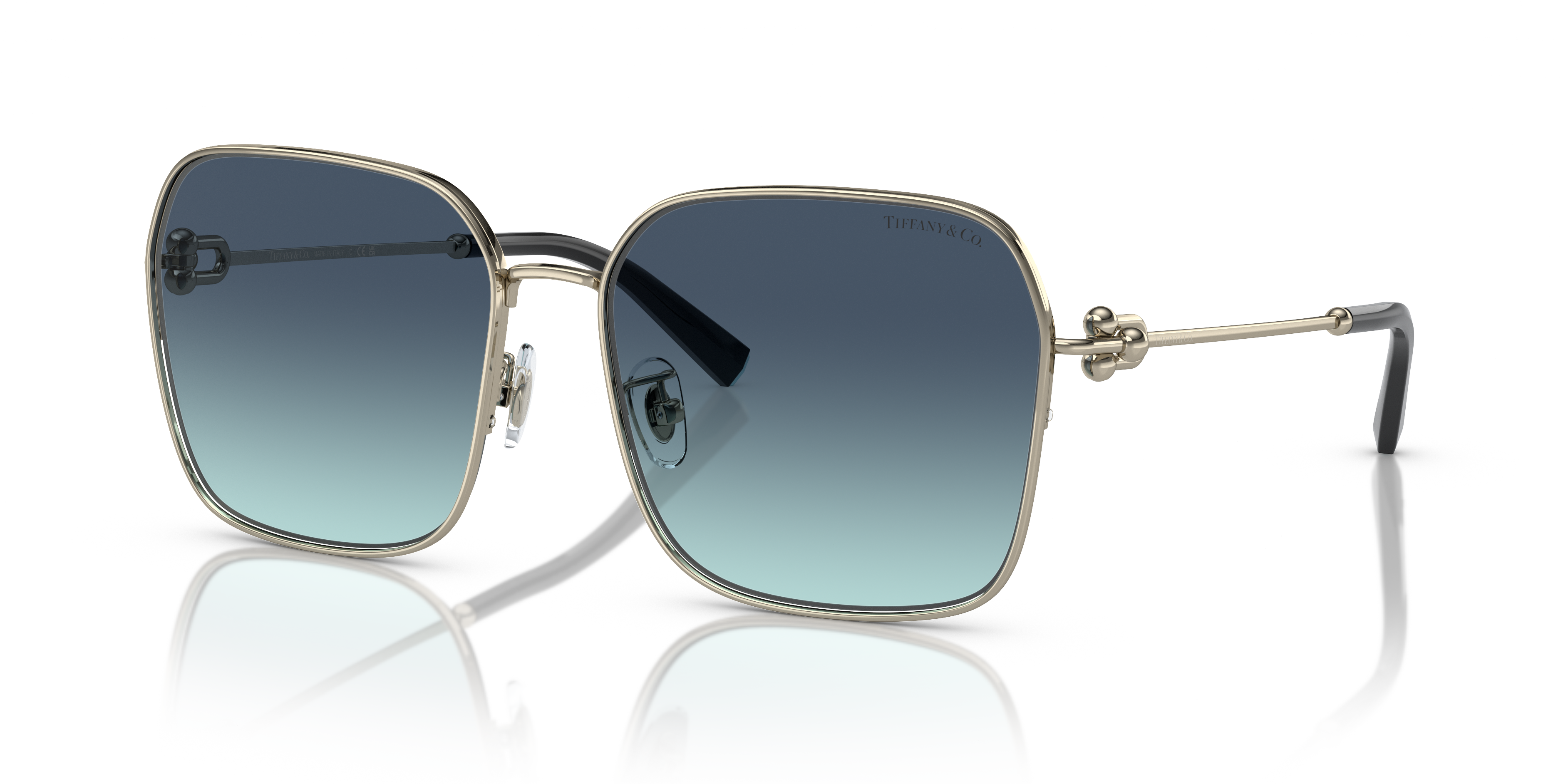 Occhiali da sole Tiffany TF3093D da donna in metallo color oro pallido, montatura dalla forma elegante e sofisticata, poggiat