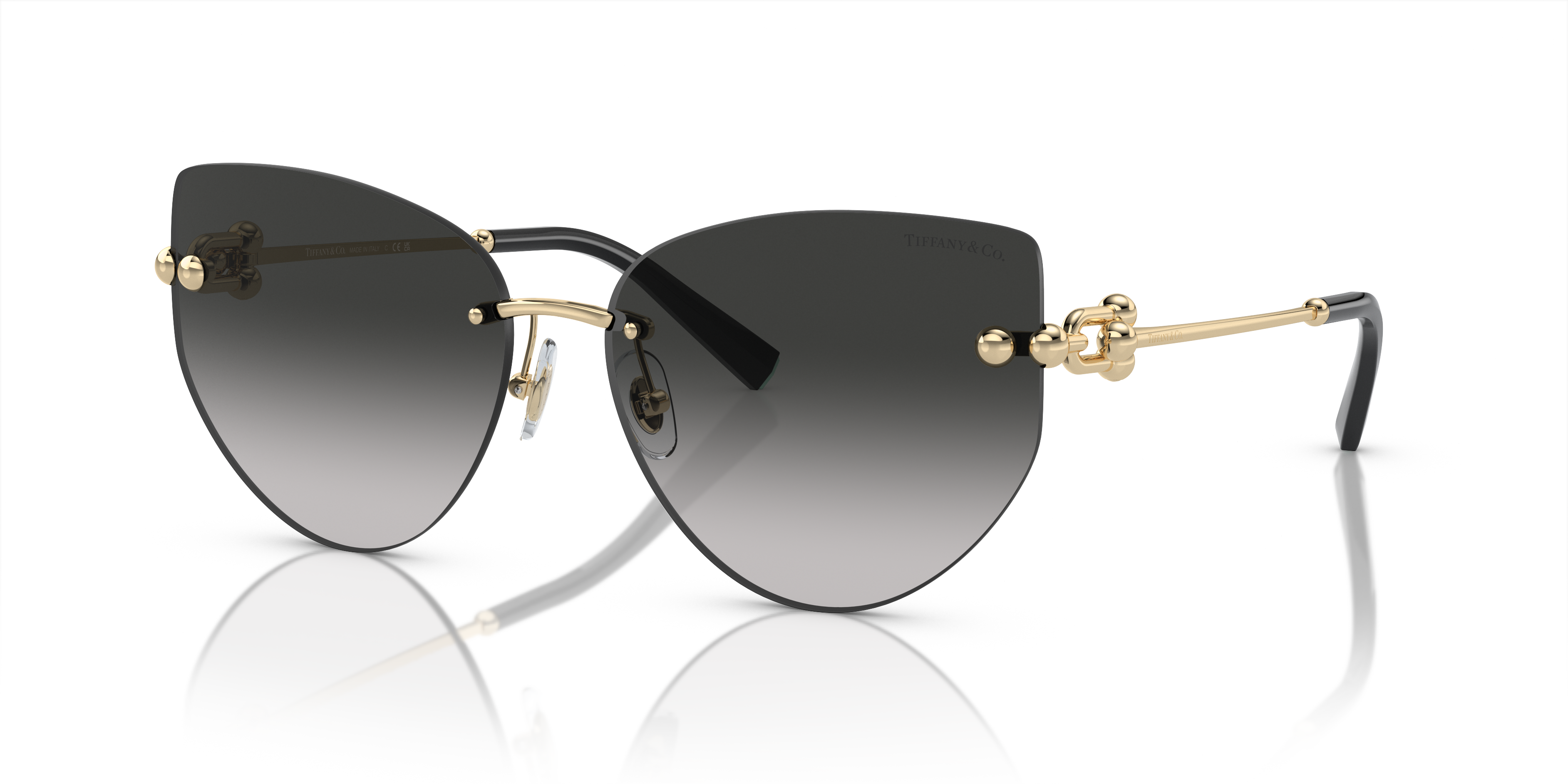 Occhiali da sole Tiffany & Co. 0TF3096 Pale Gold da donna, montatura pilot dorata, lenti sfumate.