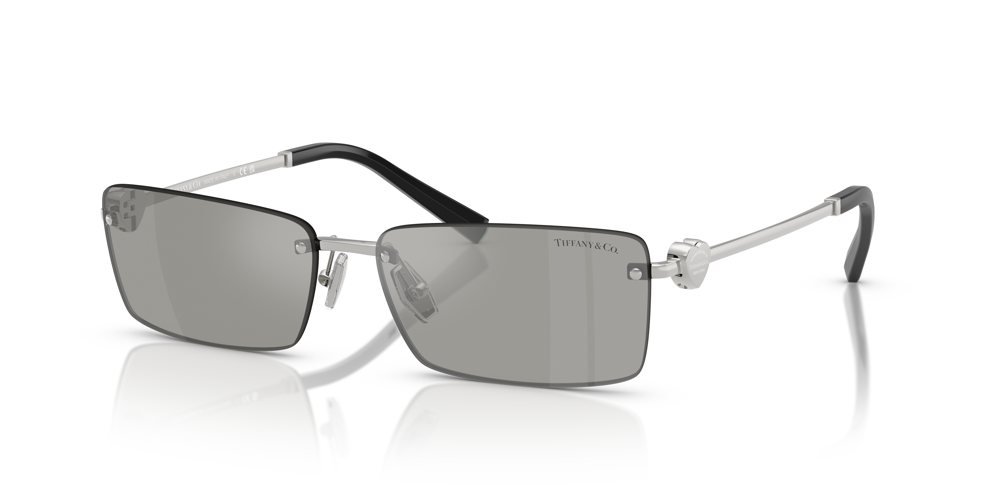 Occhiali da sole Tiffany & Co. modello TF3108B con montatura colore Silver, su sfondo neutro, che mostra i dettagli delle ast