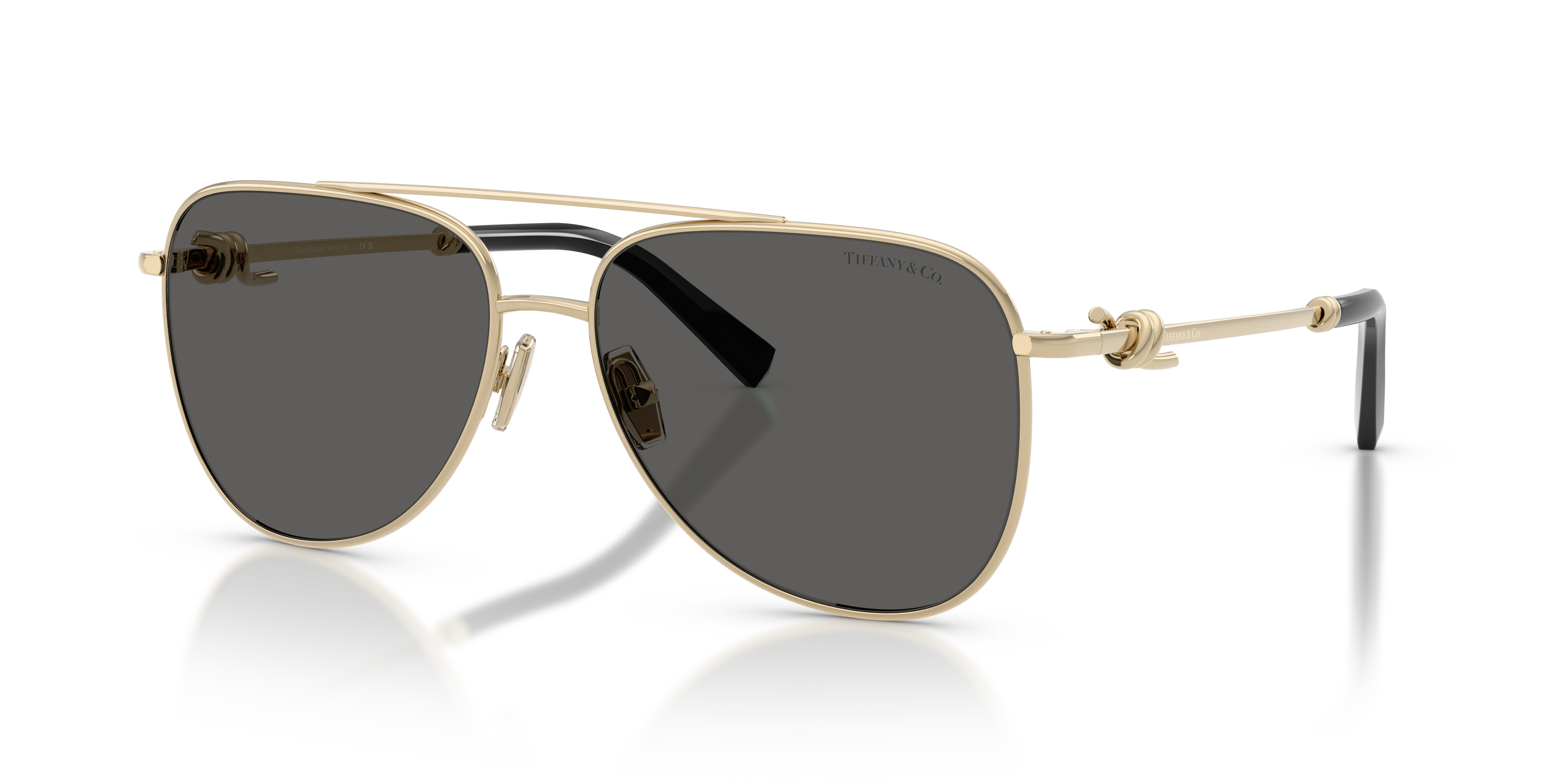 Occhiali da sole Tiffany TF3116 donna in metallo color Pale Gold, ripresi frontalmente su sfondo neutro, mostrando la montatu