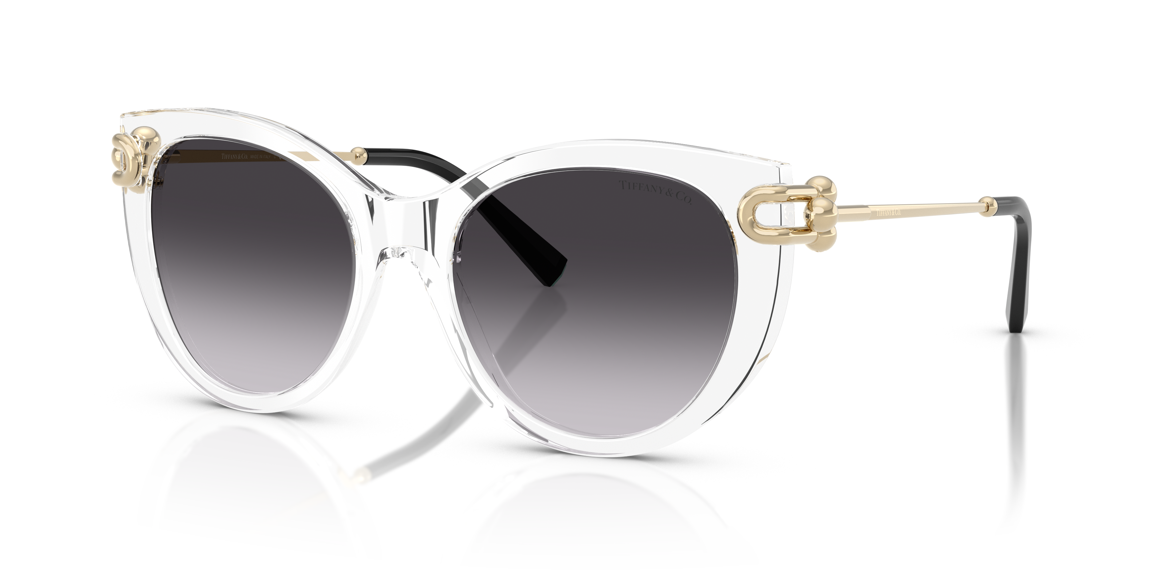 Occhiali da sole Tiffany TF4232 da donna con montatura chiara e spessa in acetato trasparente, lenti scure e logo Tiffany sul