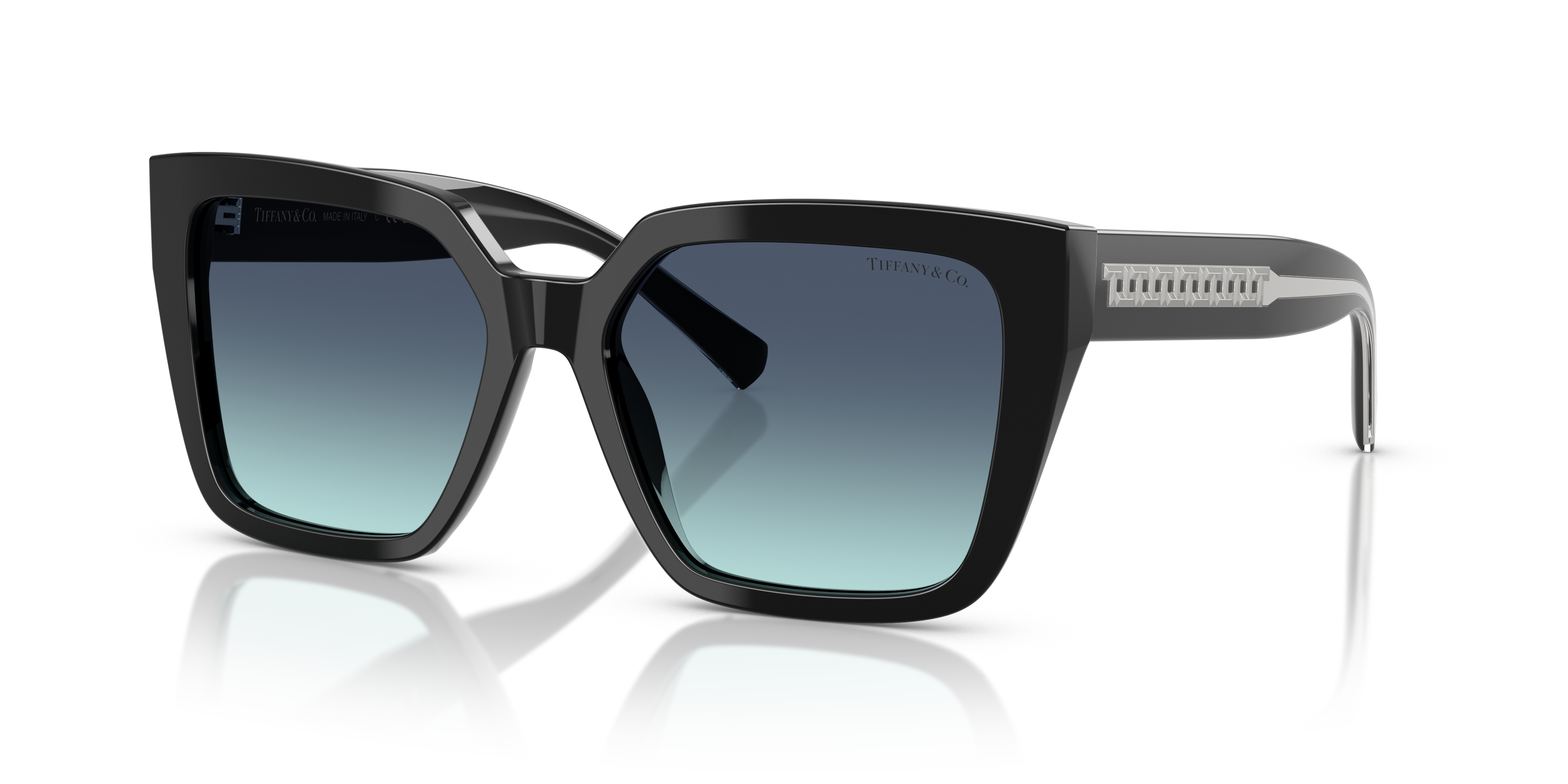 Occhiali da sole neri Tiffany & Co. modello TF4235 per donna, con montatura in acetato e logo sulle aste, appoggiati su super