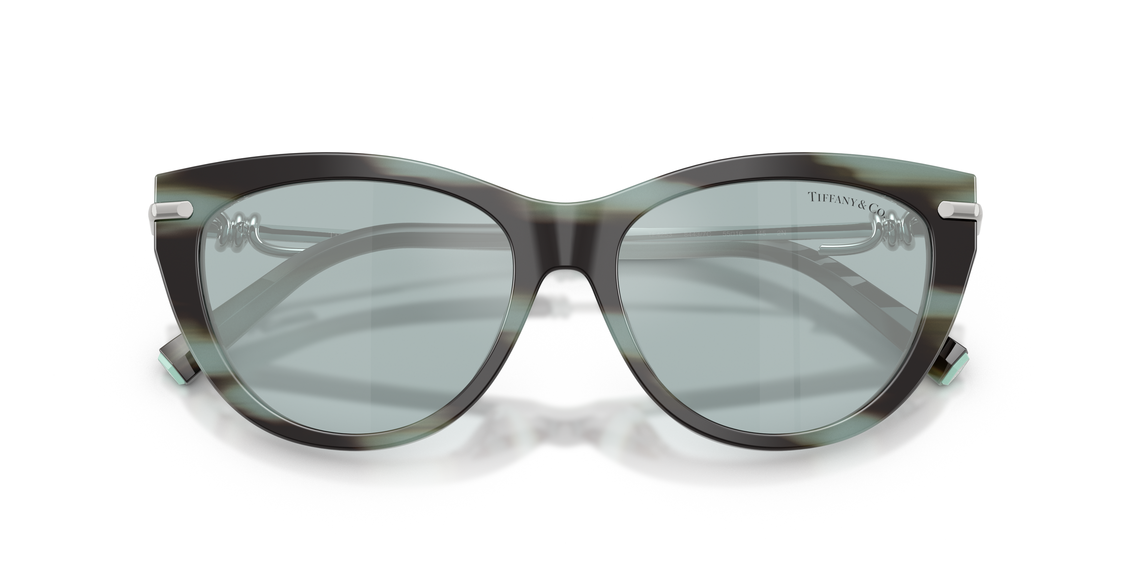 Occhiali da sole Tiffany & Co. TF4253 da donna con montatura nera e aste interne blu Tiffany, posati su una superficie bianca
