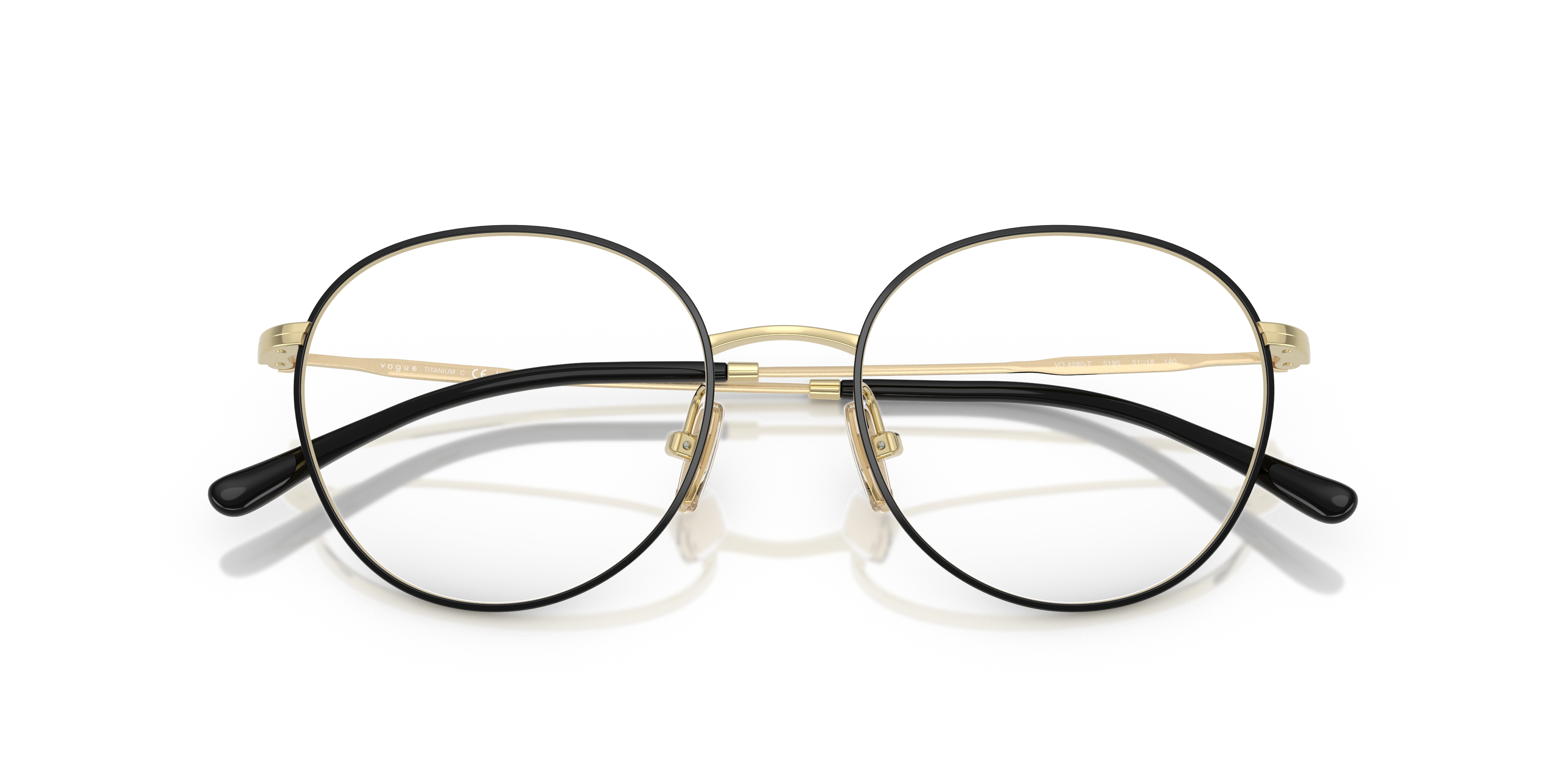 Occhiali da sole da donna Vogue Eyewear modello VO4280T di colore rame con montatura metallica e lenti scure, su sfondo neutr