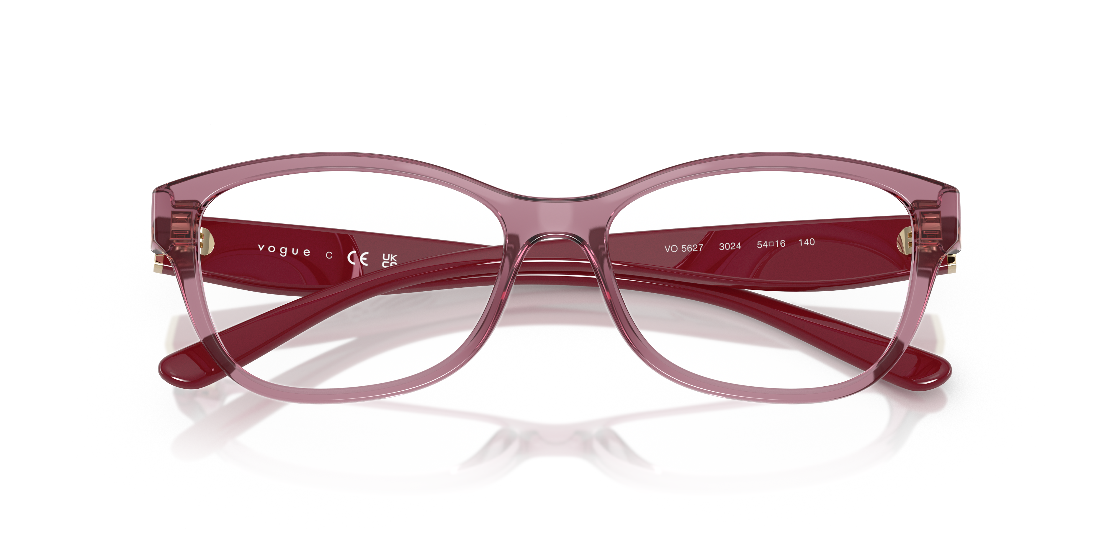 Occhiali da sole Vogue Eyewear VO5627 da donna, montatura grigio trasparente con lenti grigie, in primo piano su sfondo chiar