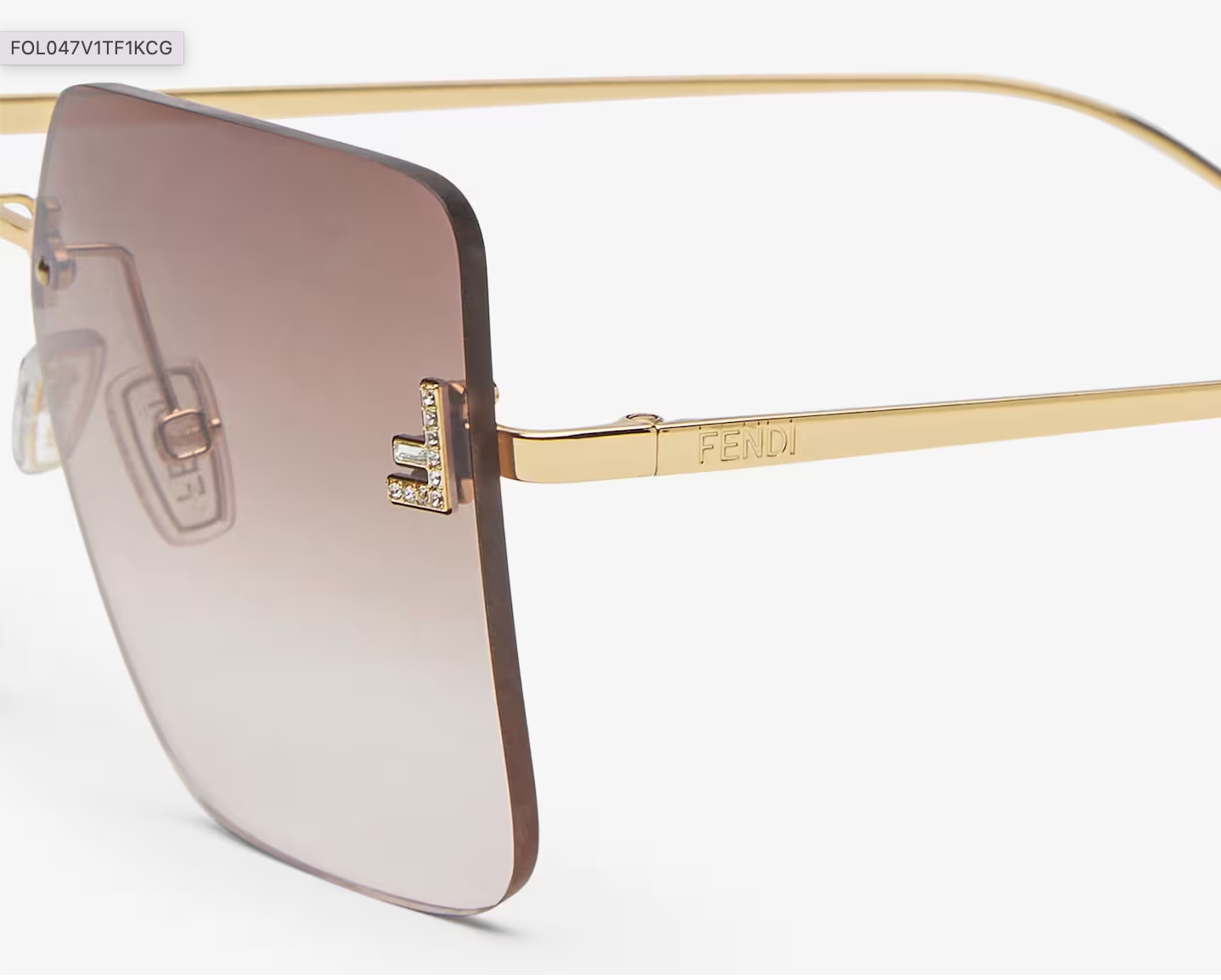 Fendi First Sunglasses in gold metal and two-tone shaded lenses