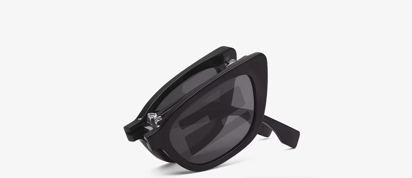 Baguette Occhiali da sole sfilata pieghevoli neri con logo Baguette